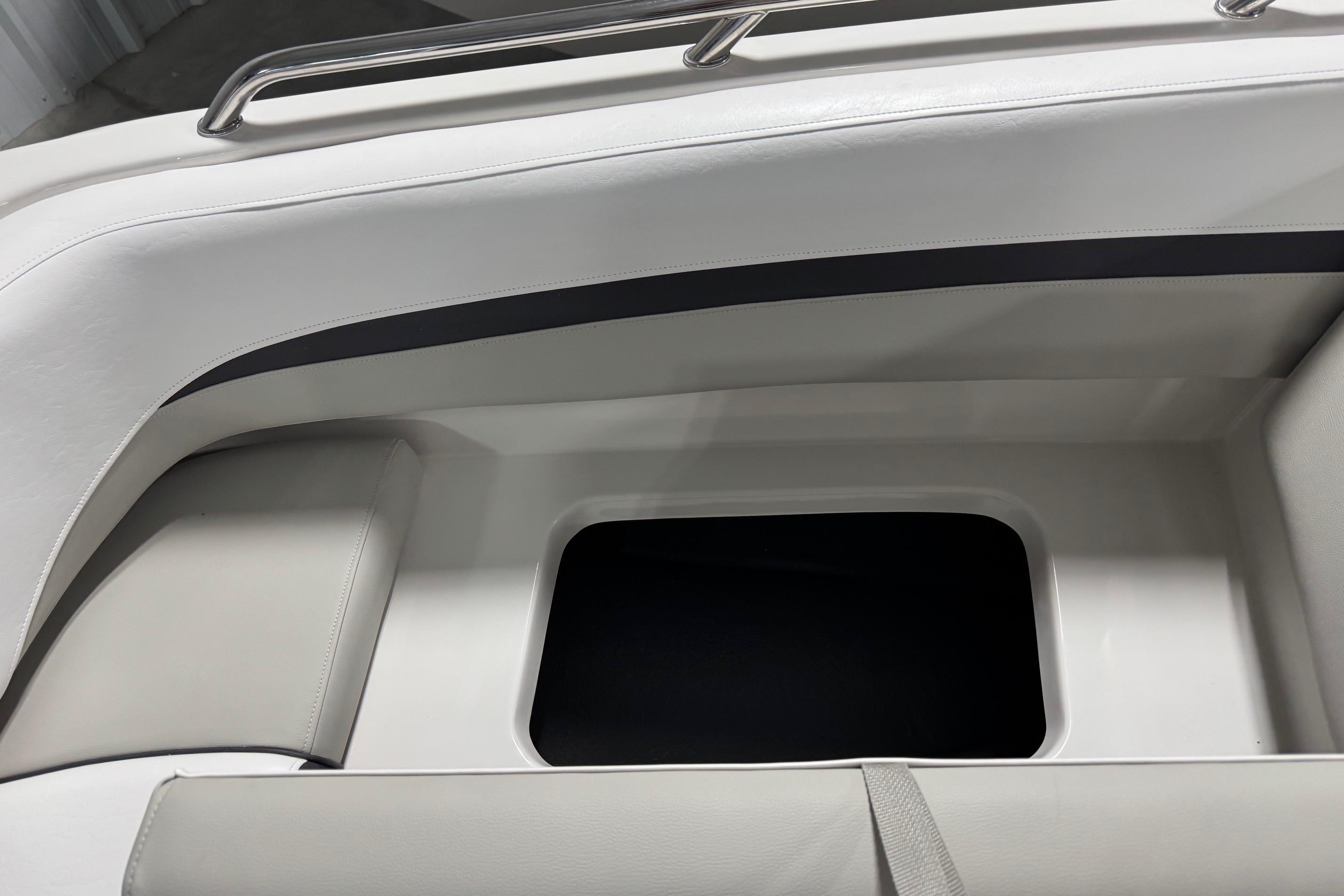 2026 Starcraft SVX 191 OB boat interior seating with storage compartment.