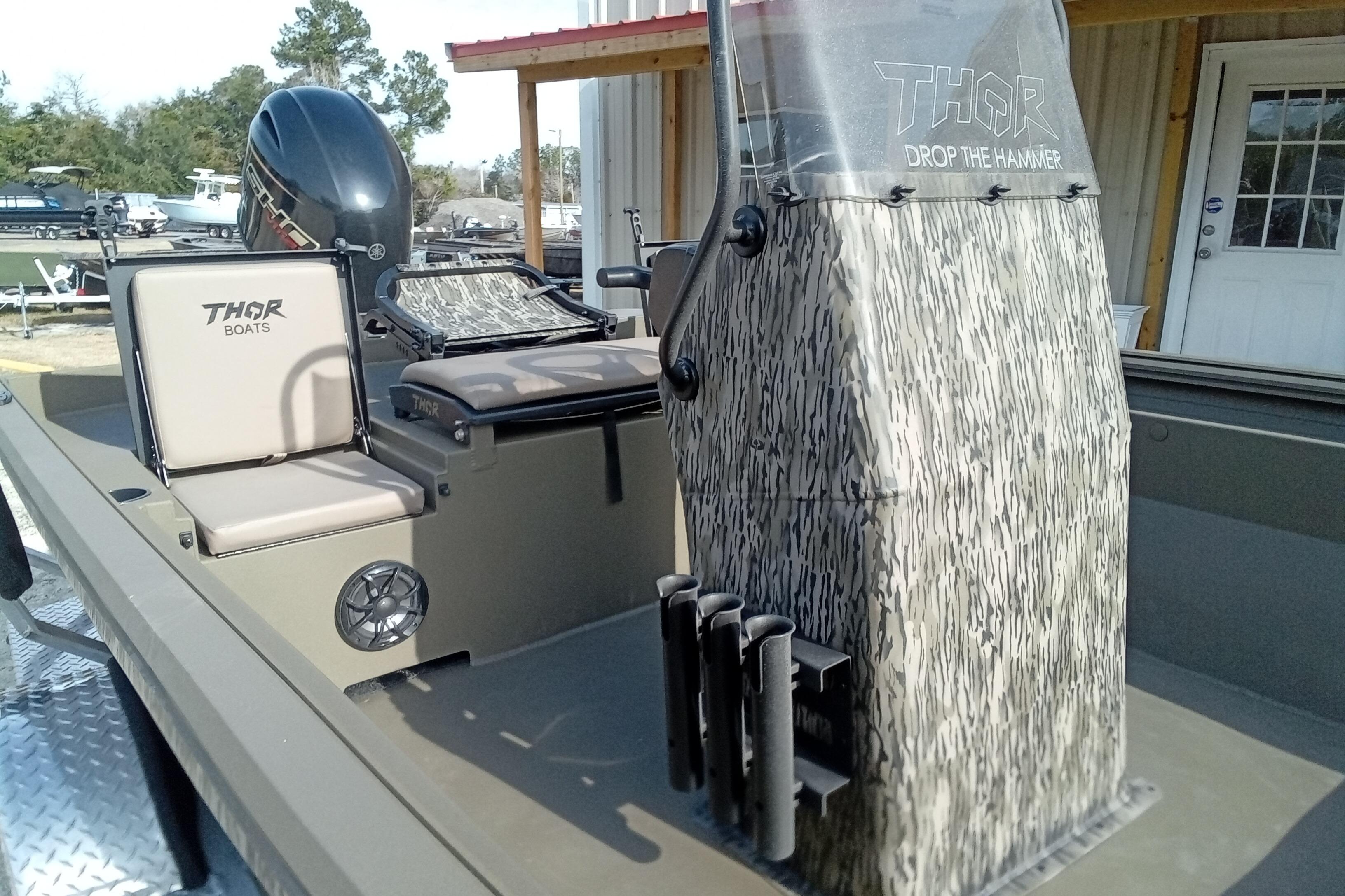 2026 Thor 1900 Low Country Elite boat with camouflage console and seating.