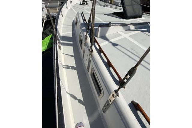 1982 Lancer 45 Motorsailer deck view with rigging and windows.