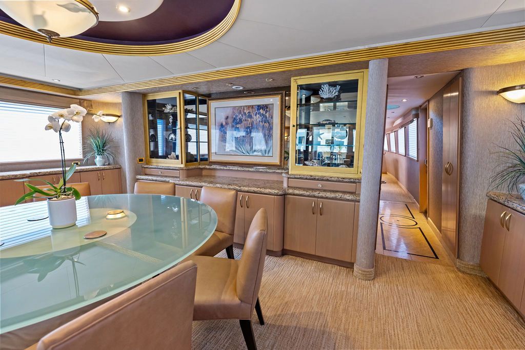 Luxurious dining area on a 1999 Westport 112 yacht.