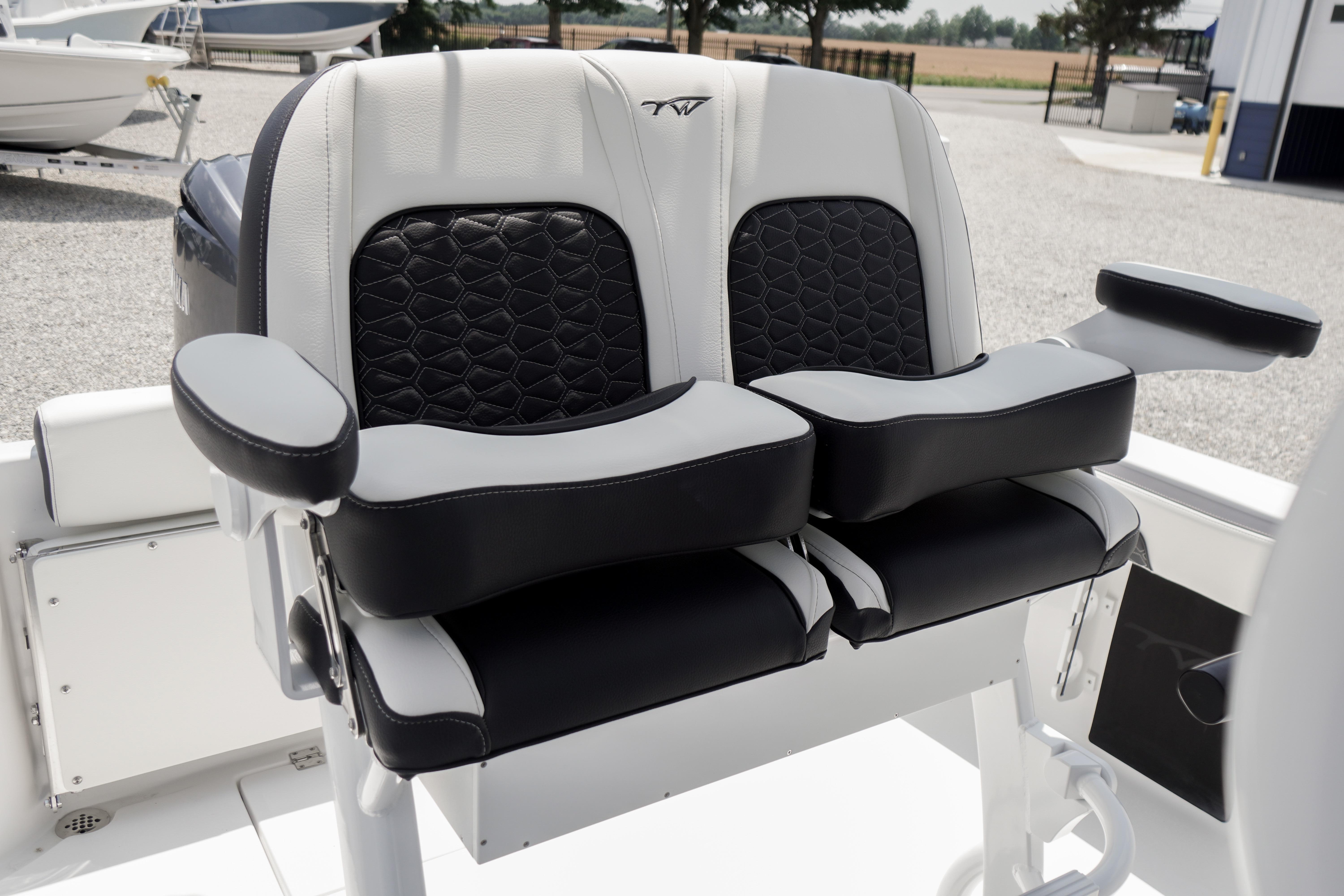 2027 Tidewater 220 CC Adventure boat seats with black and white cushioned design.