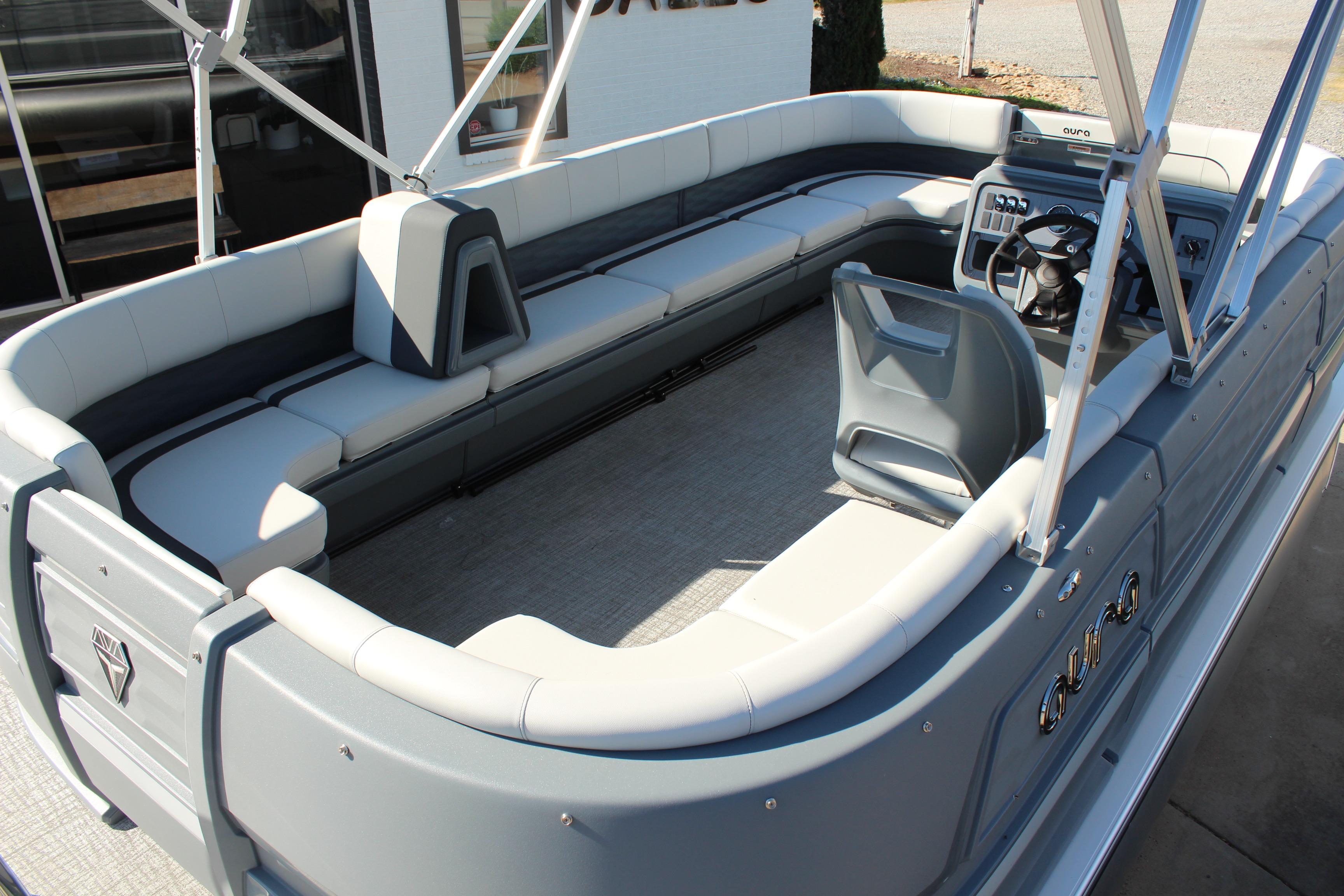 2026 Tahoe Pontoon Aura boat interior with spacious seating and modern helm design.