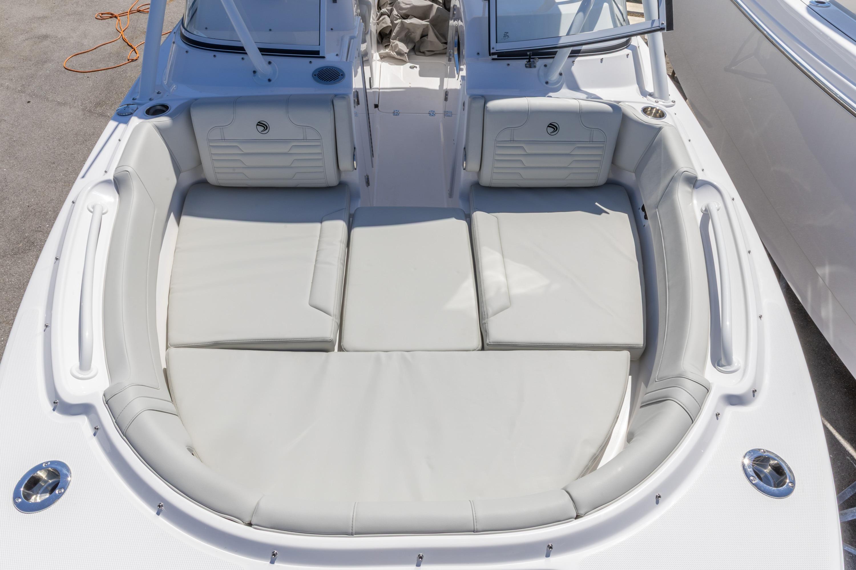 2026 Edgewater 248CX Crossover boat with spacious seating and sleek design.
