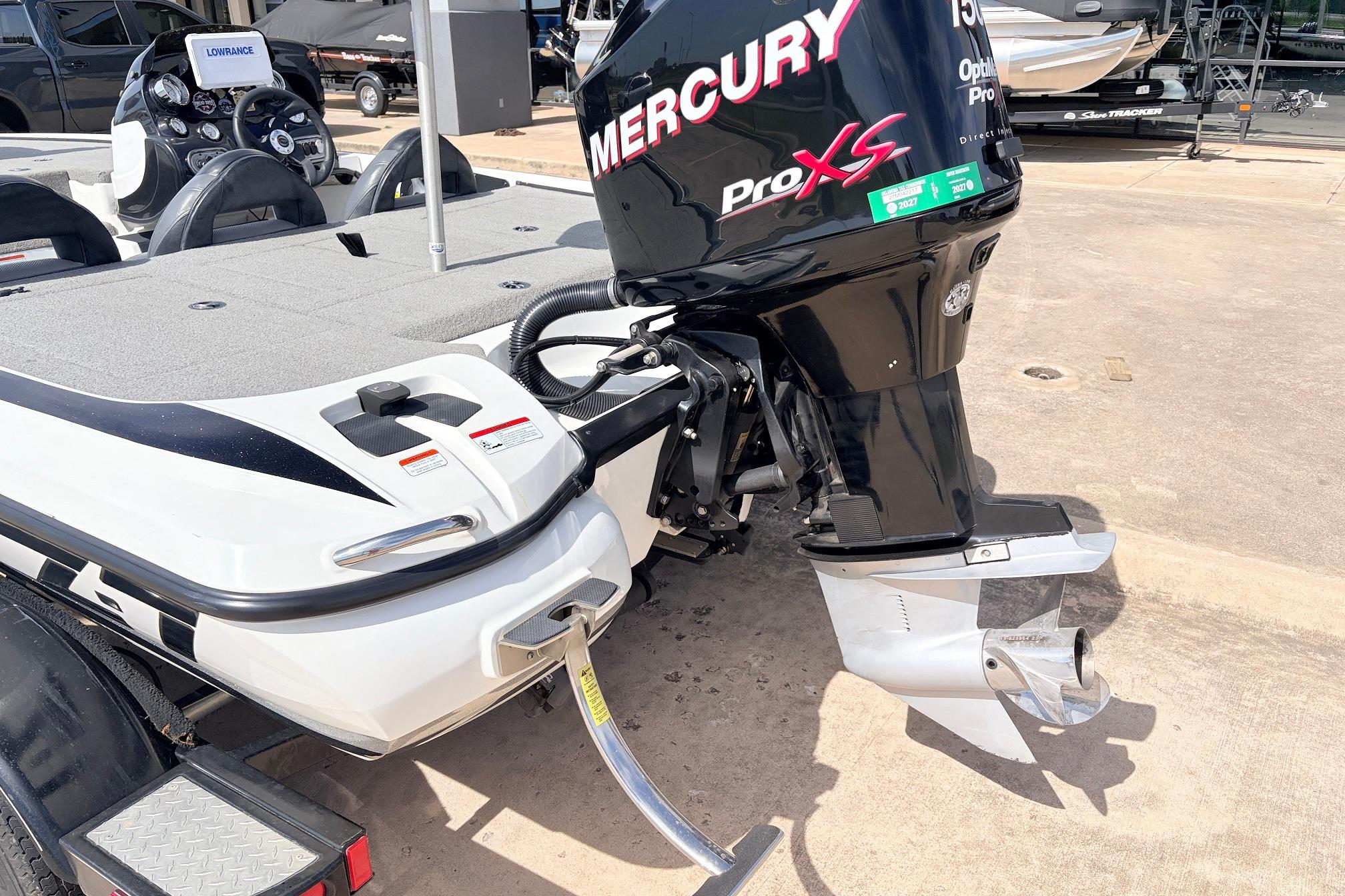 2011 Nitro Z-7 boat with Mercury Pro XS outboard motor, parked on a trailer.