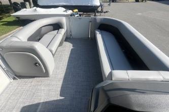 2026 Sun Tracker Party Barge 18 DLX interior with spacious seating and modern design.
