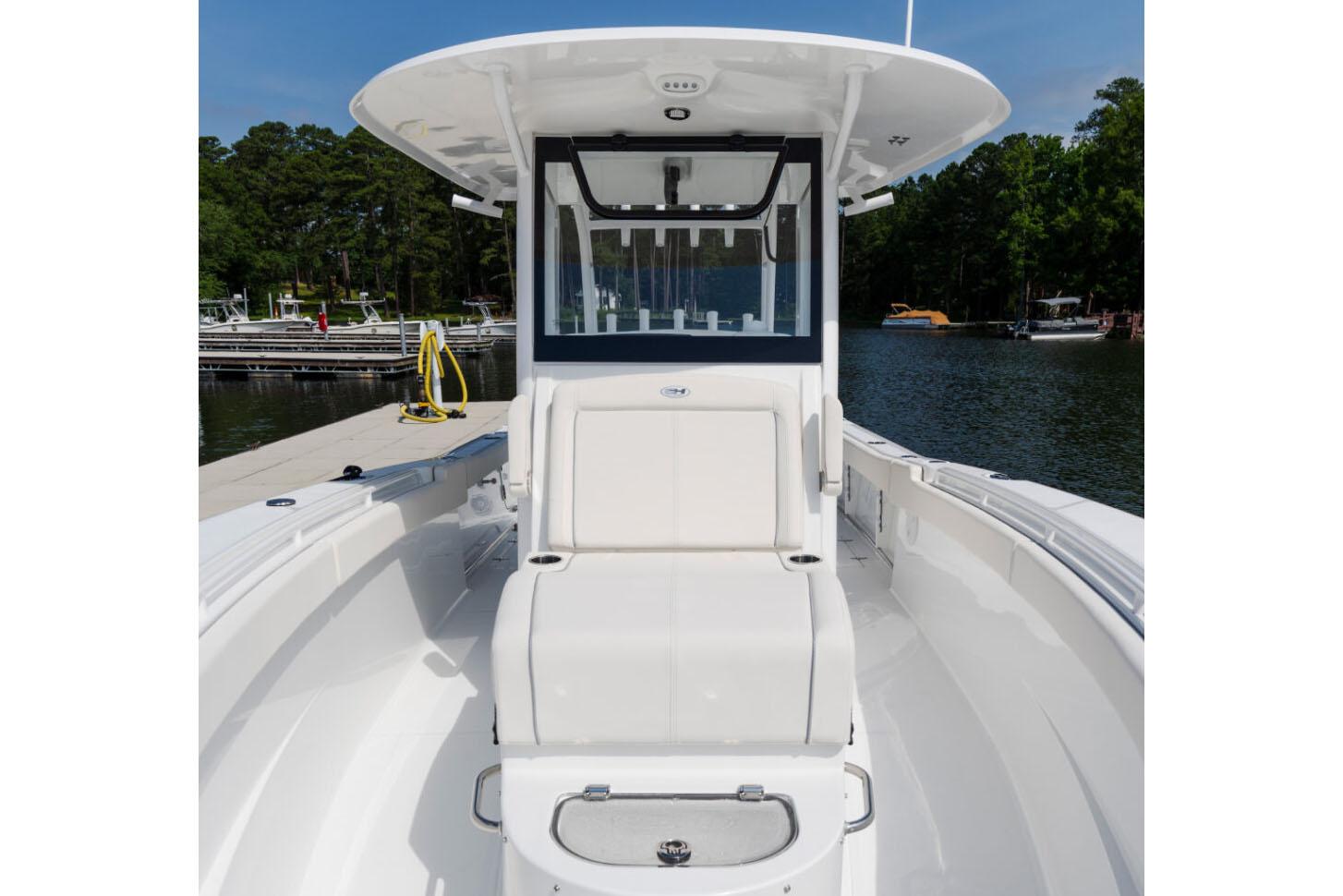 Manufacturer Provided Image: 2026 Sea Hunt Gamefish 30 Coffin Box boat docked on a serene lake.