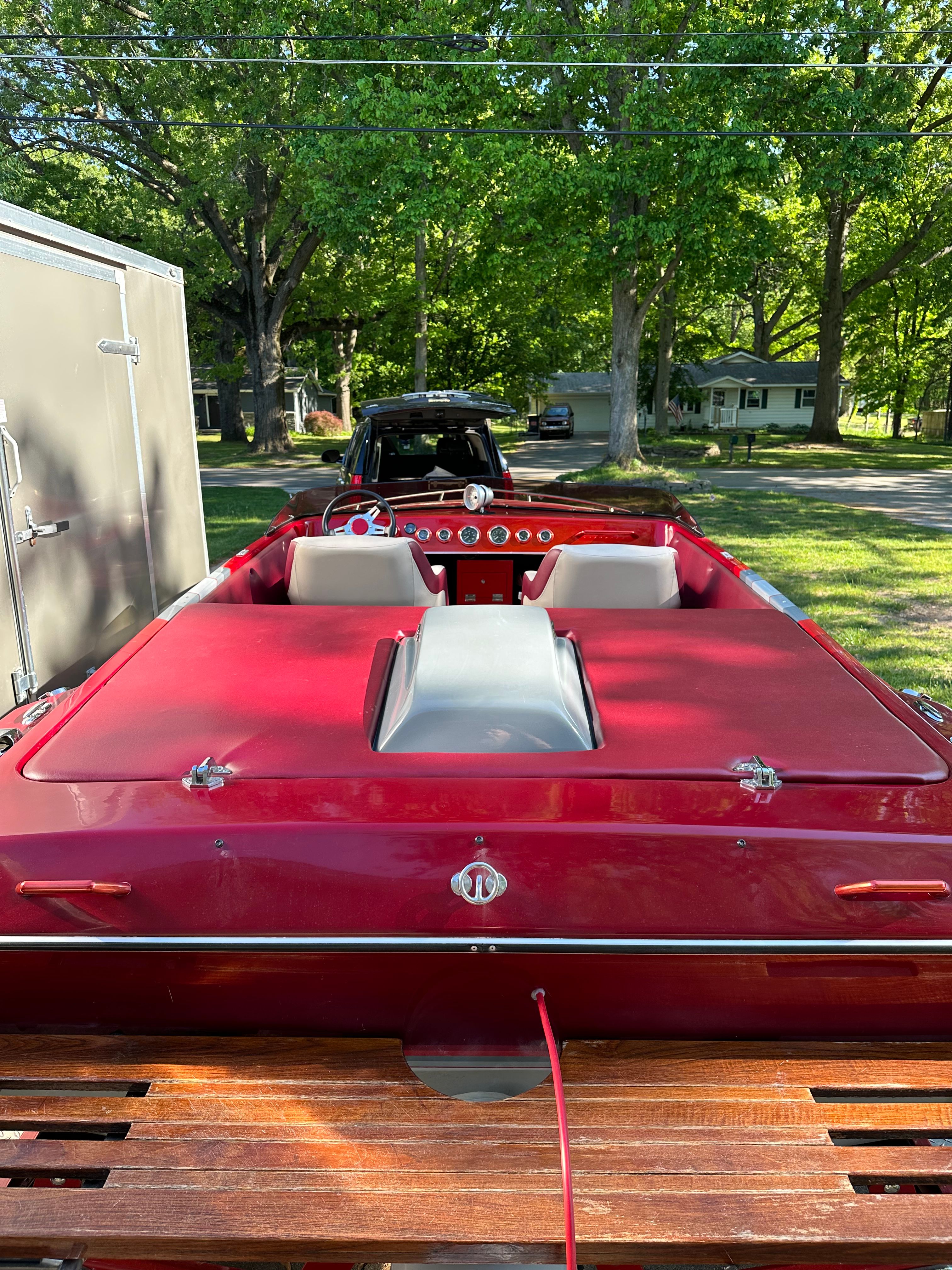 Red 1989 Custom Jet Boat 22' parked outdoors.