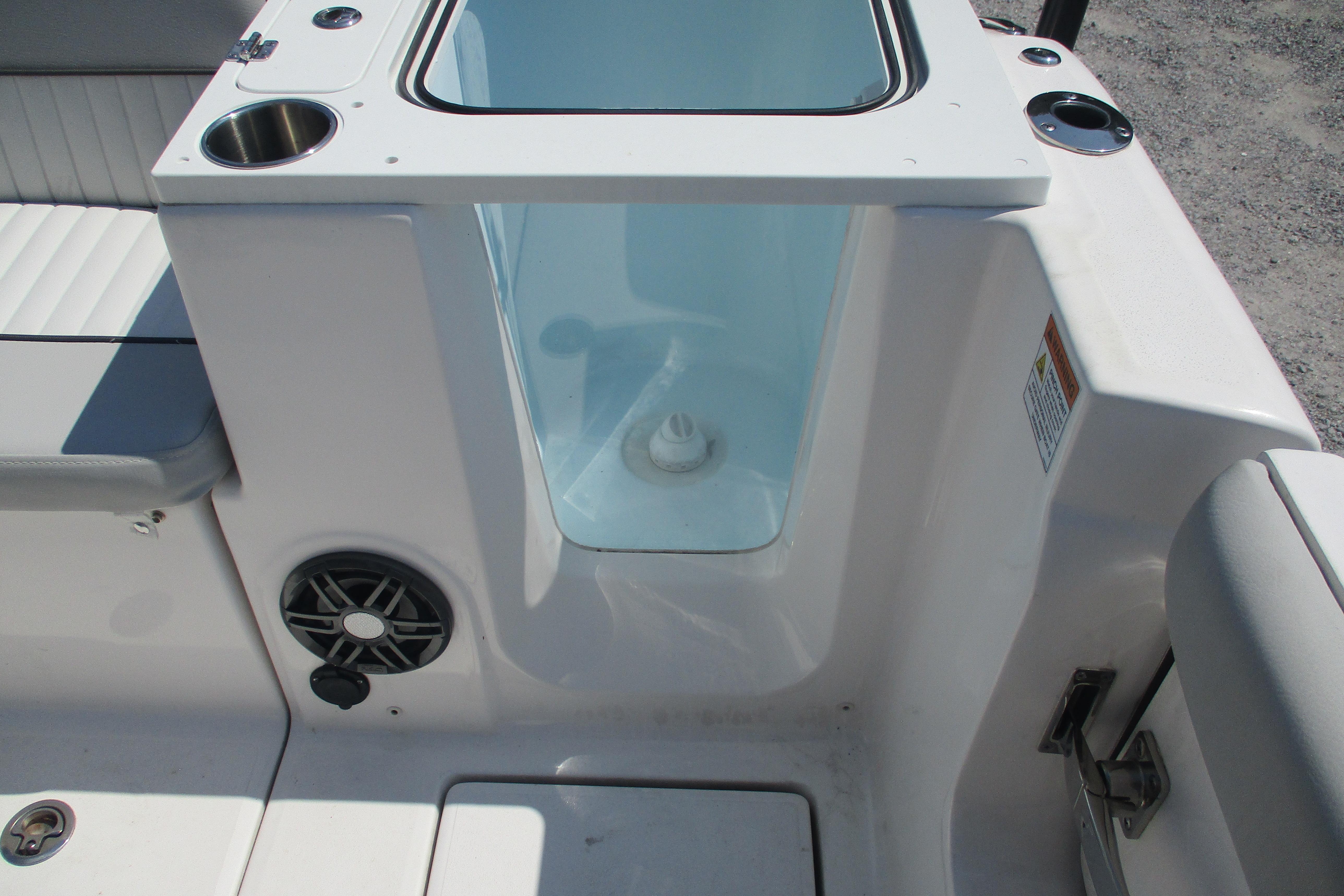 2024 Sea Fox 268 Commander boat interior with livewell and speaker.