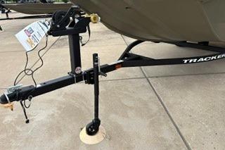 2026 Tracker Grizzly 1756 T Marsh trailer hitch on concrete surface.