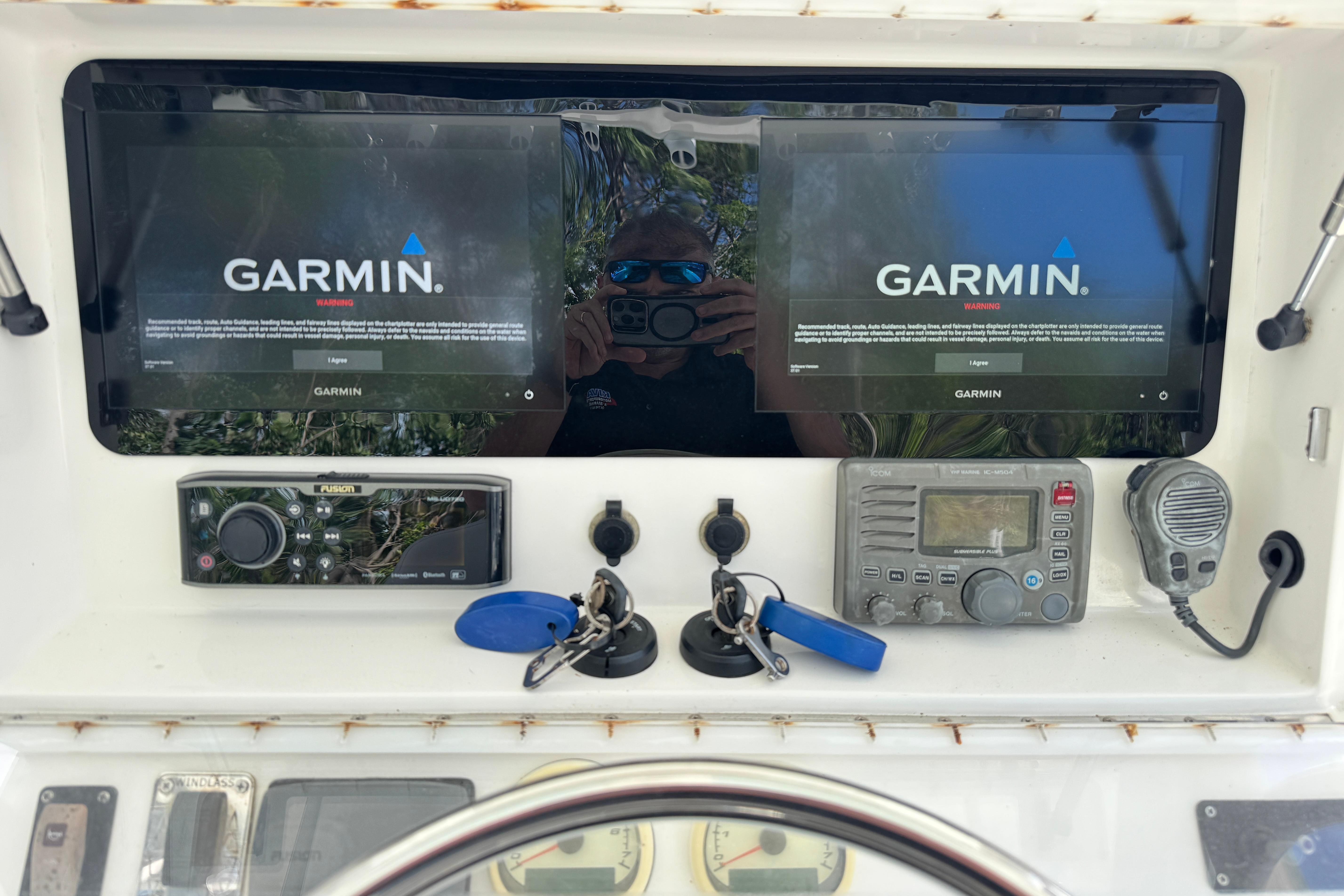 Control panel of a 2014 Blackwater 36 Sportfish with Garmin displays and marine electronics.