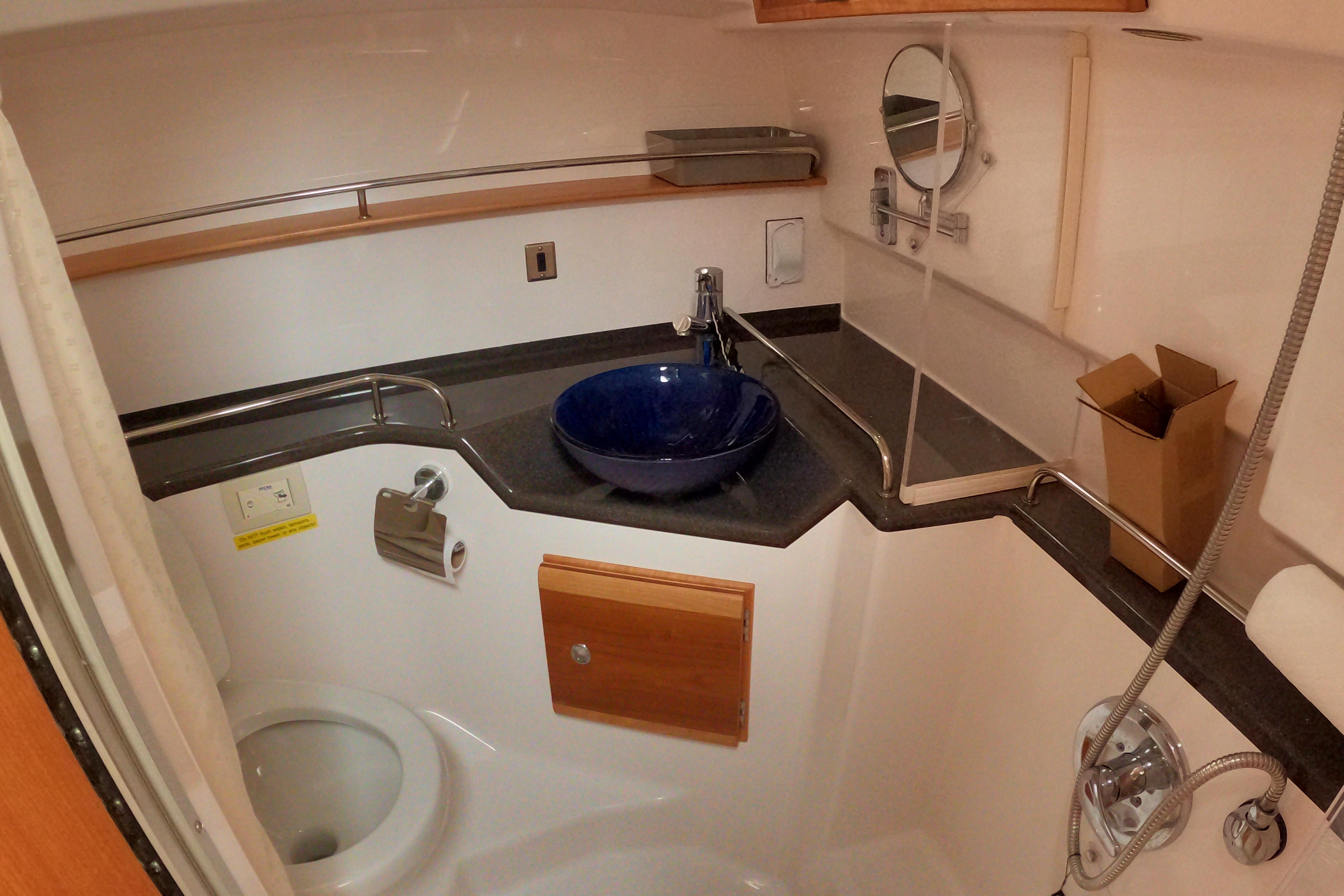 2019 Cutwater C-30 Sedan bathroom with modern sink and shower.