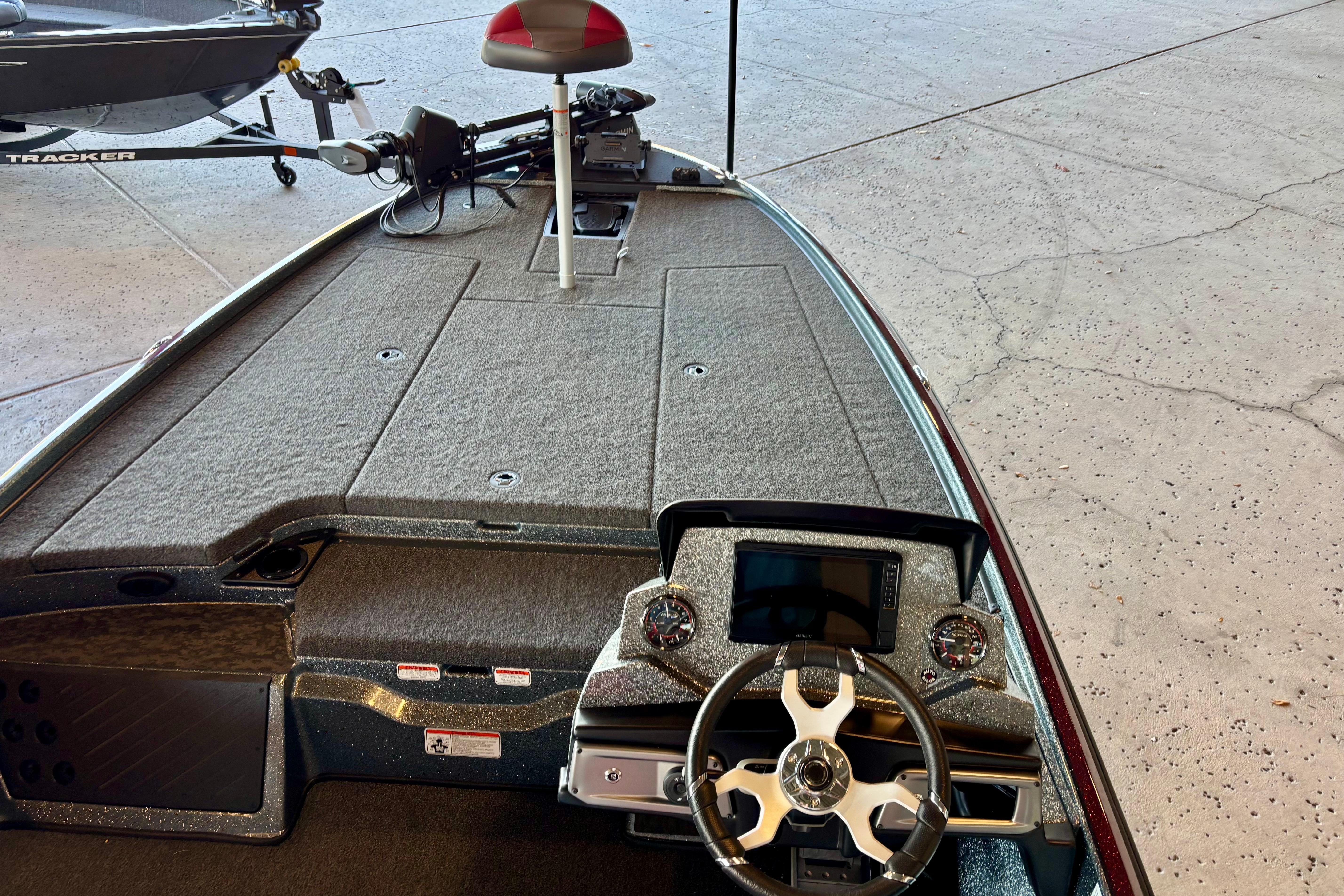 2026 Nitro Z20 XL Pro boat interior with steering wheel and dashboard controls.