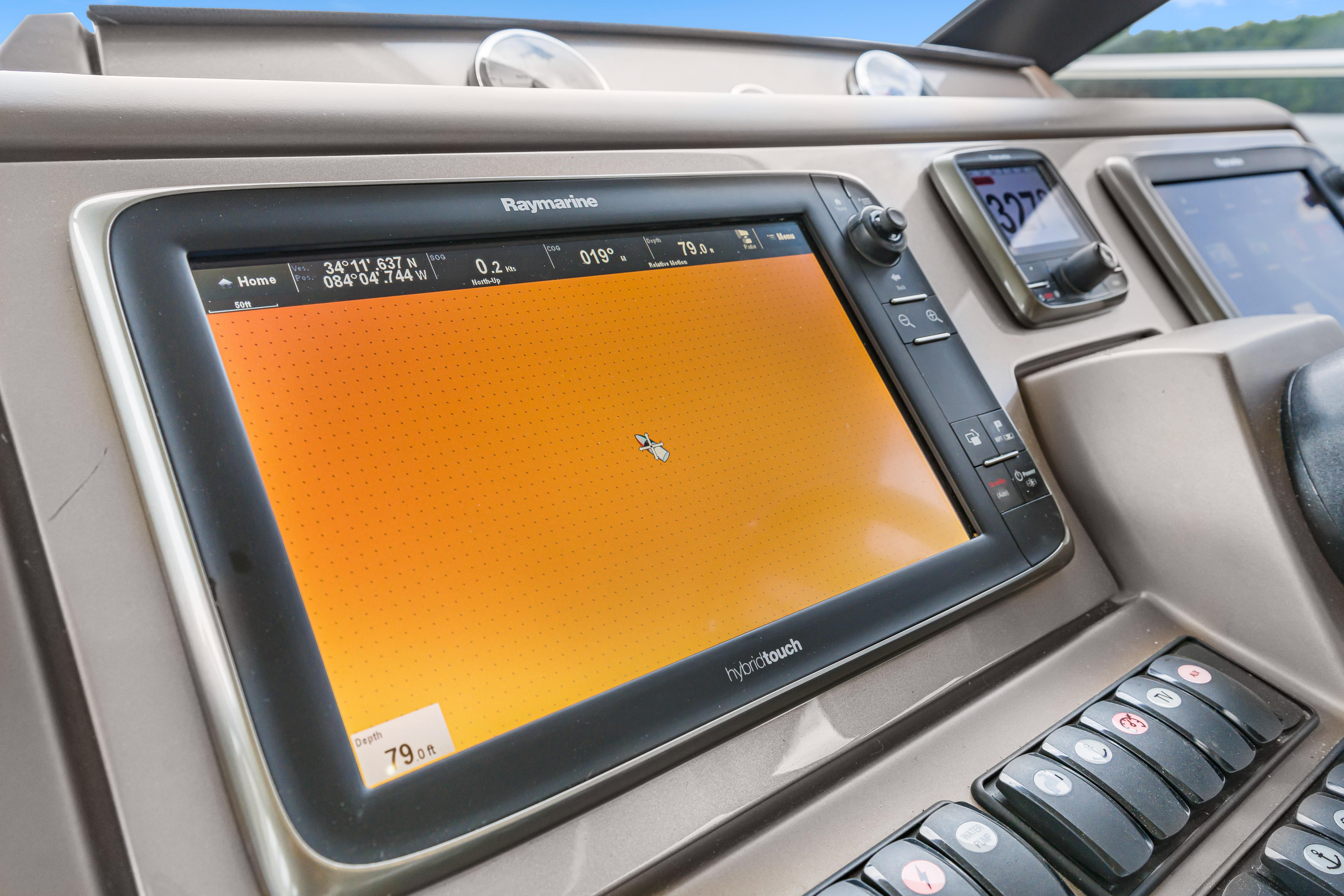 Control panel of a 2017 Prestige 500 yacht with Raymarine navigation display.