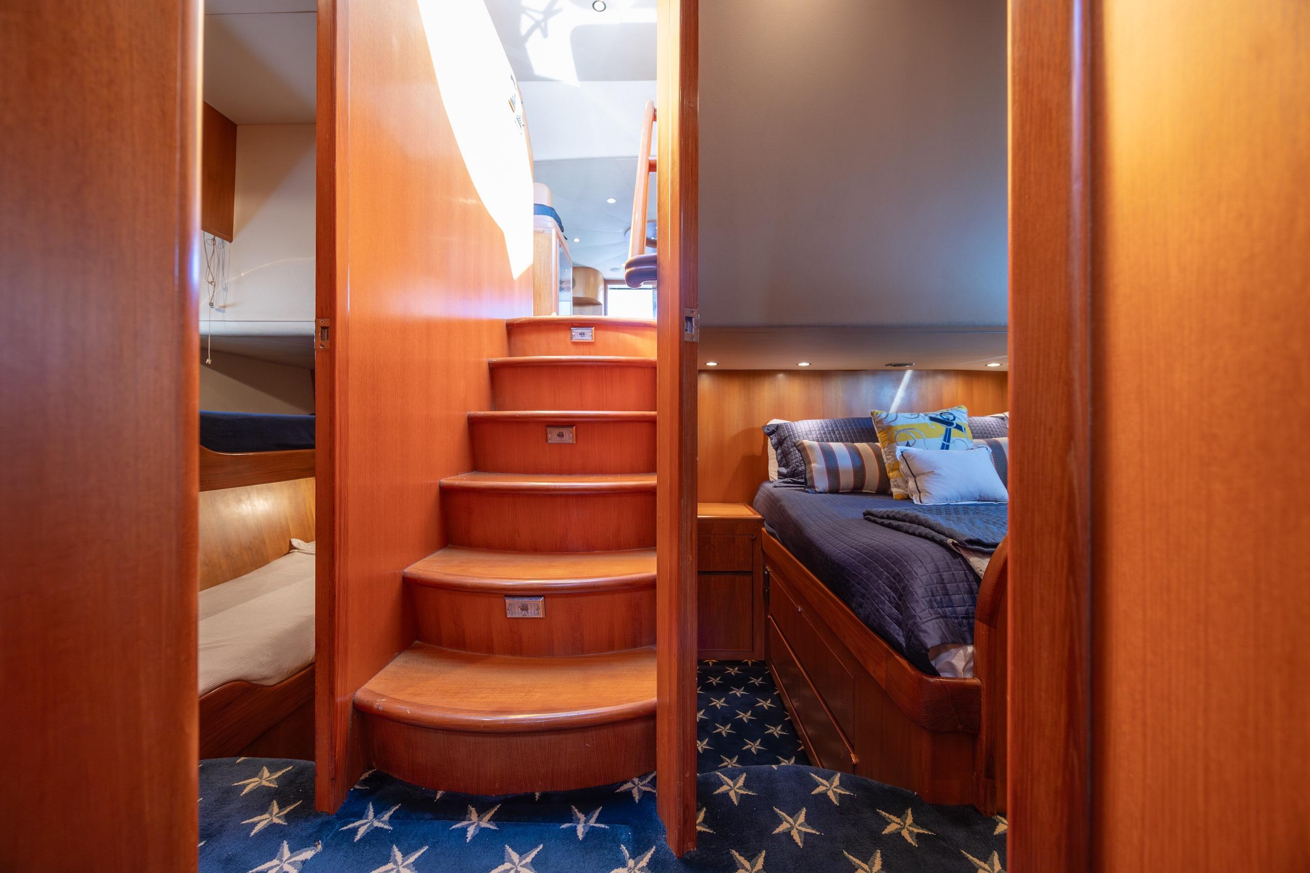 Luxurious interior of 2005 Ocean Alexander 52 Sedan yacht with elegant wood finishes.