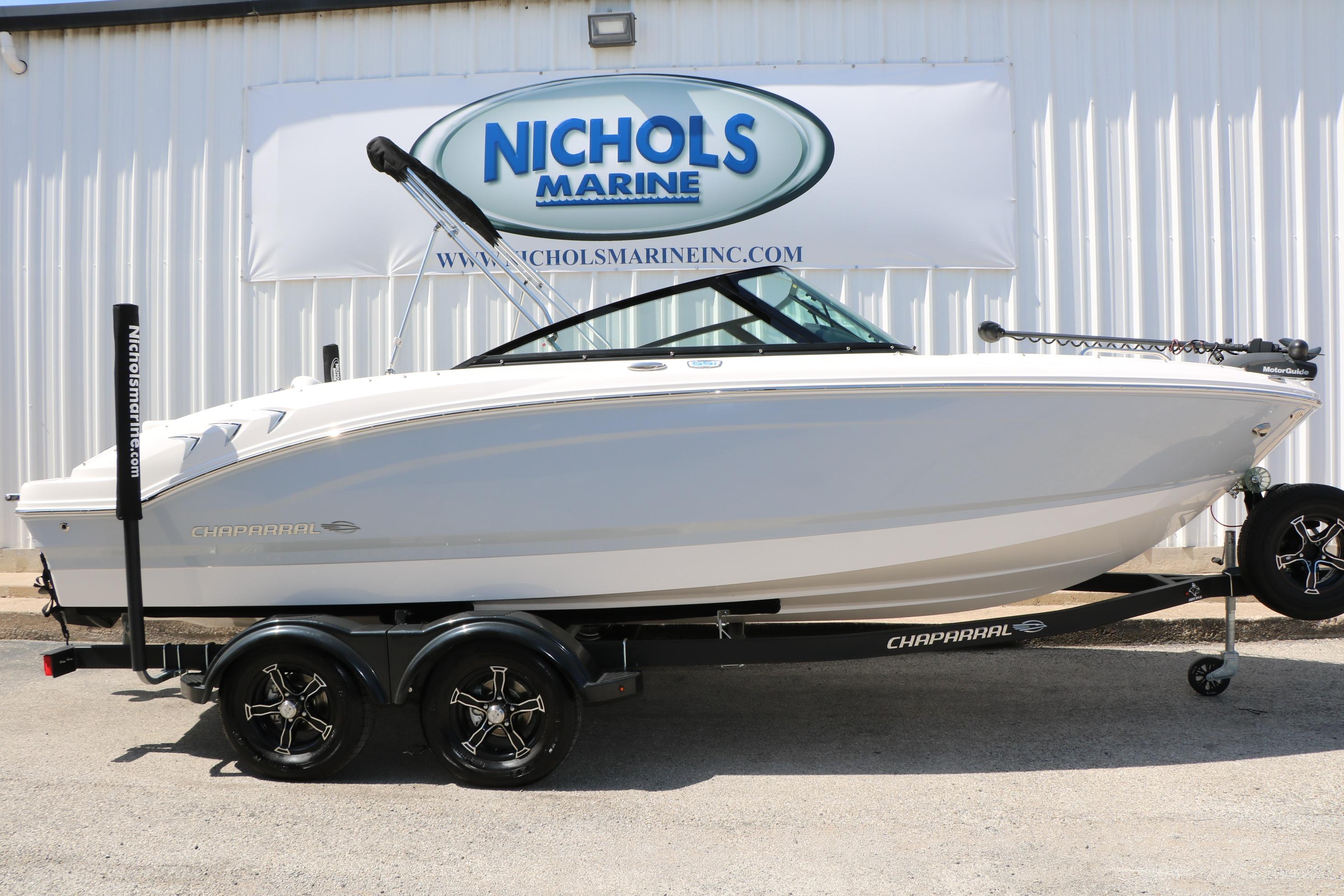 2025 Chaparral 21 SSi Ski & Fish boat on trailer at Nichols Marine.