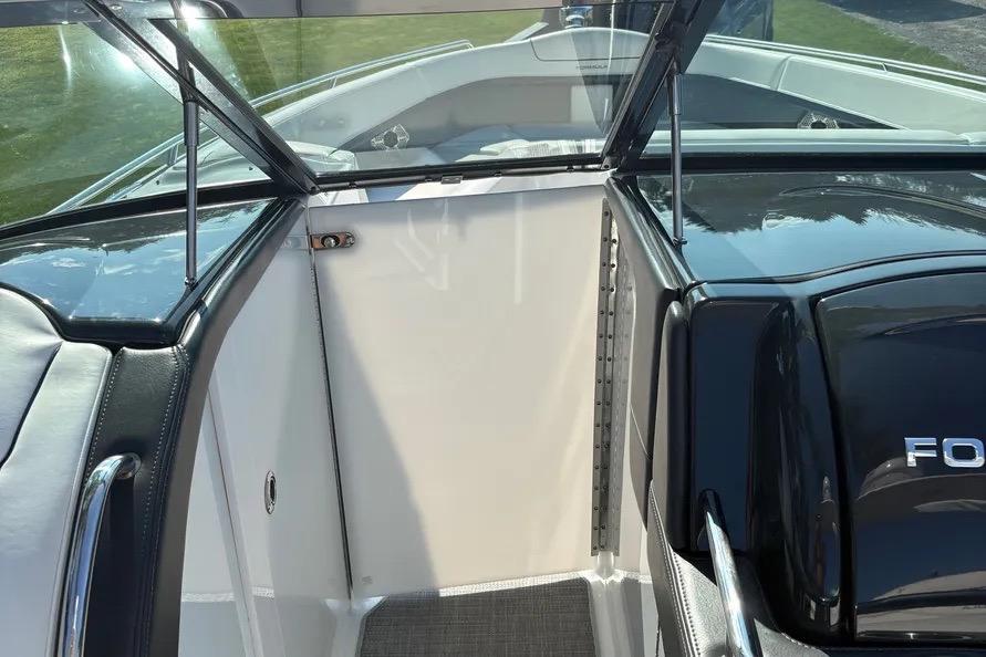 2015 Formula 350 Crossover Bowrider interior with open windshield and sleek design.