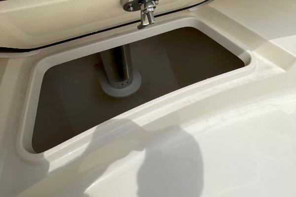 Storage compartment on a 2020 Scout 420 LXF boat, featuring a sleek design.