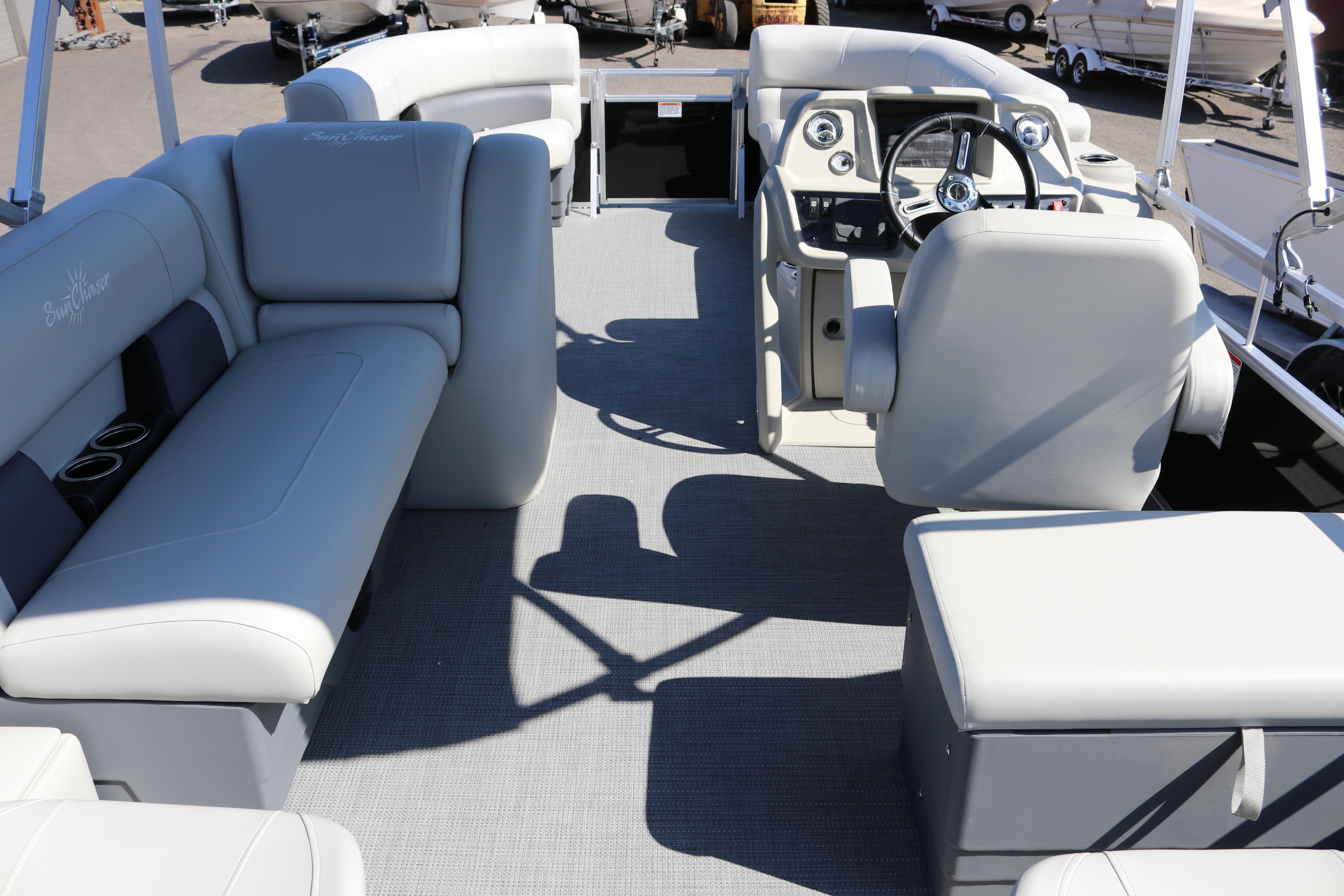 2025 SunChaser Vista 20 Fish pontoon boat interior with plush seating and modern helm.
