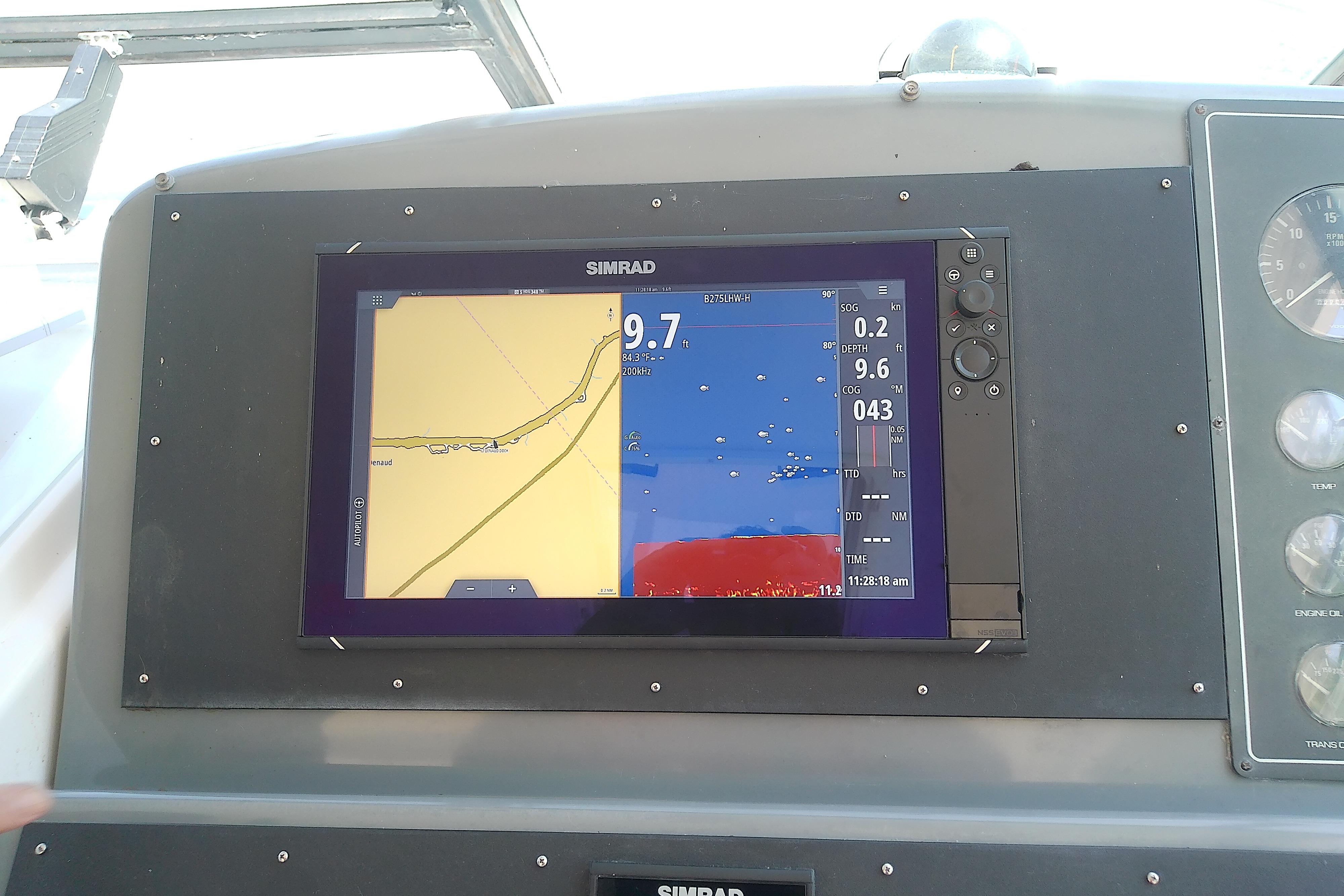 Simrad navigation display on 2000 Tiara Yachts 4100 Open, showing map and data.