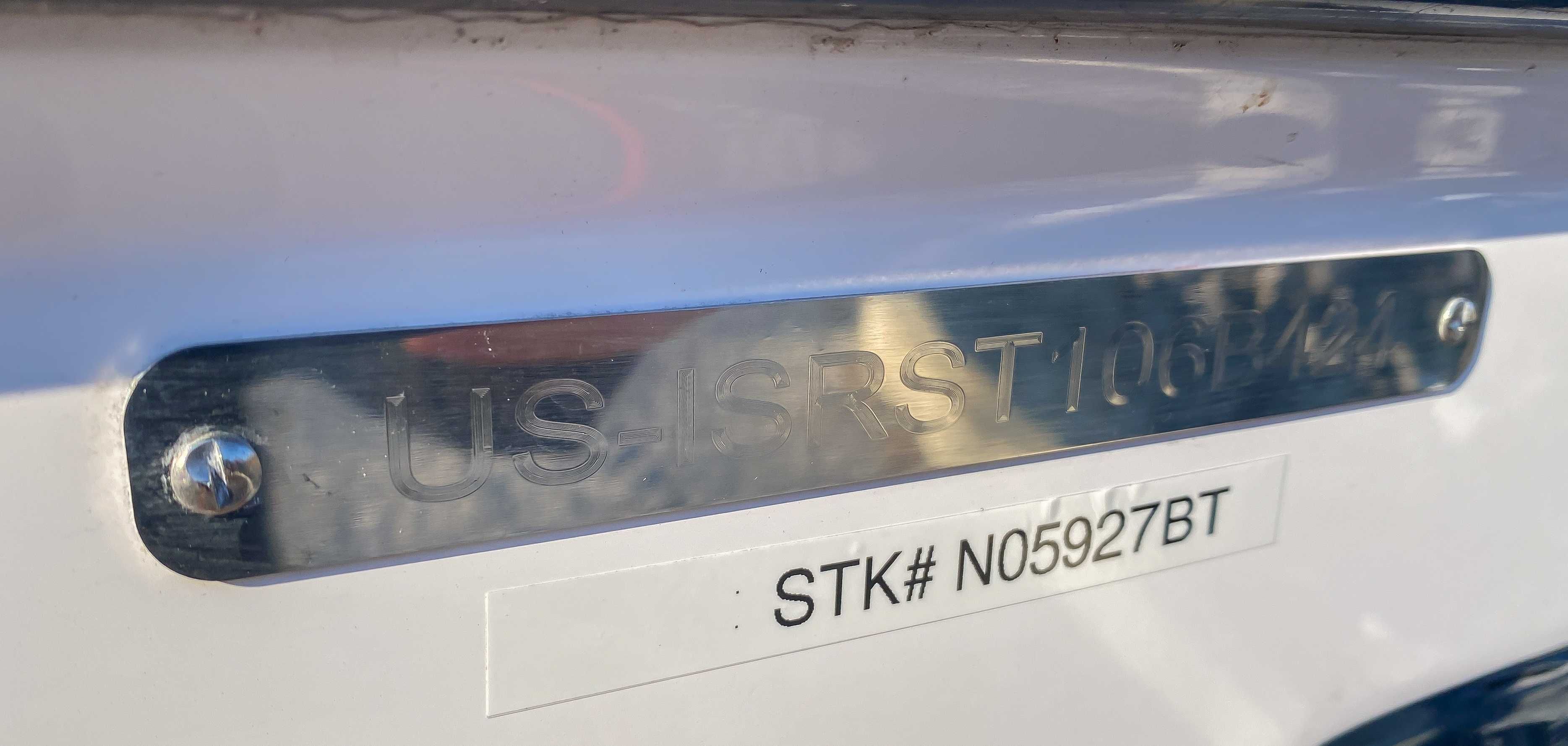2024 Supra SE serial number and stock number on metal plate.