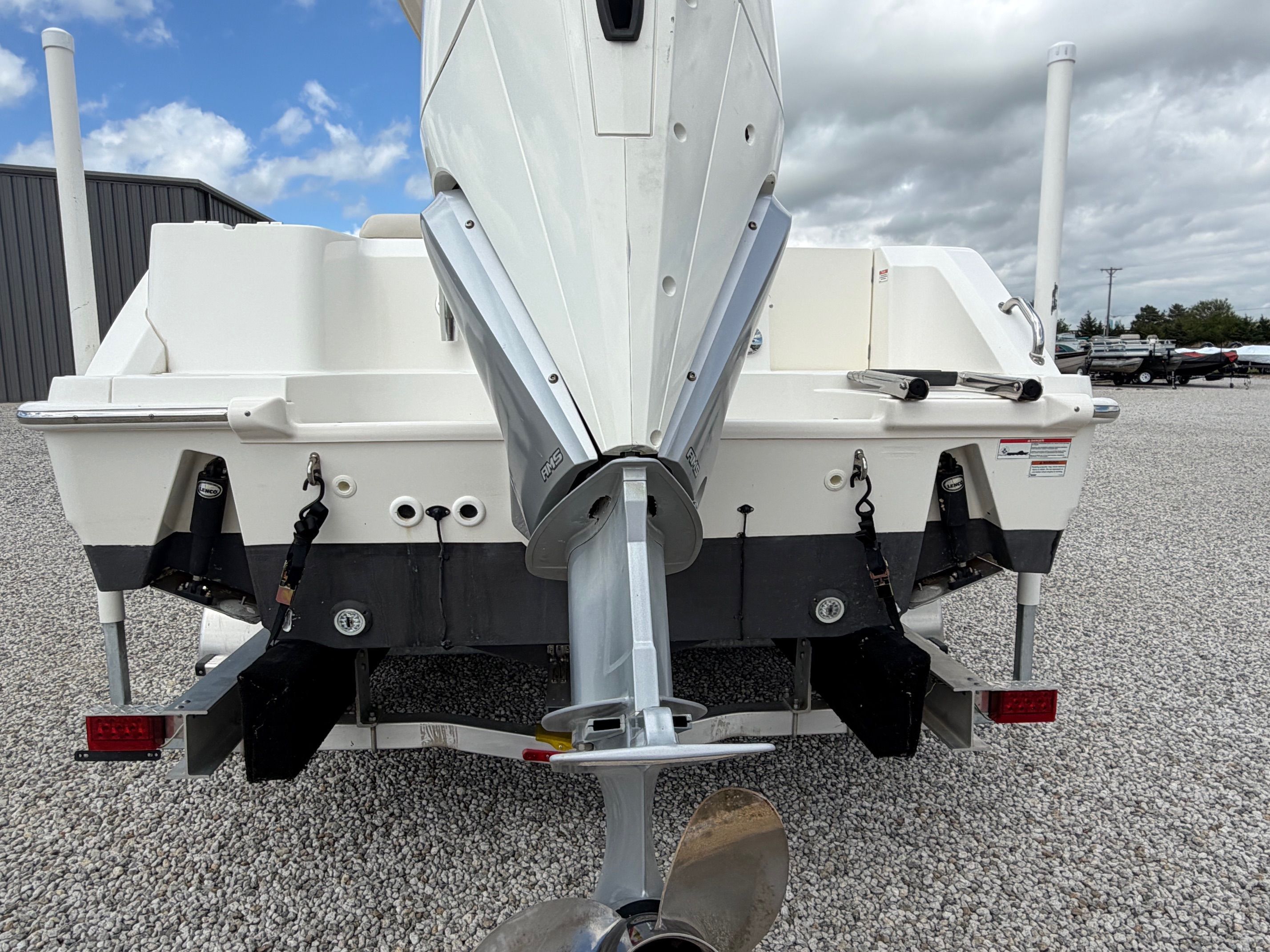 Rear view of a 2020 Boston Whaler 230 Outrage boat.