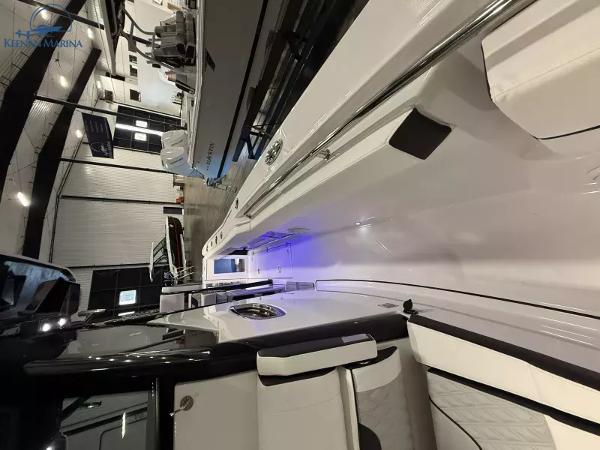 2025 Blackfin 272CC boat interior with sleek design and ambient lighting.