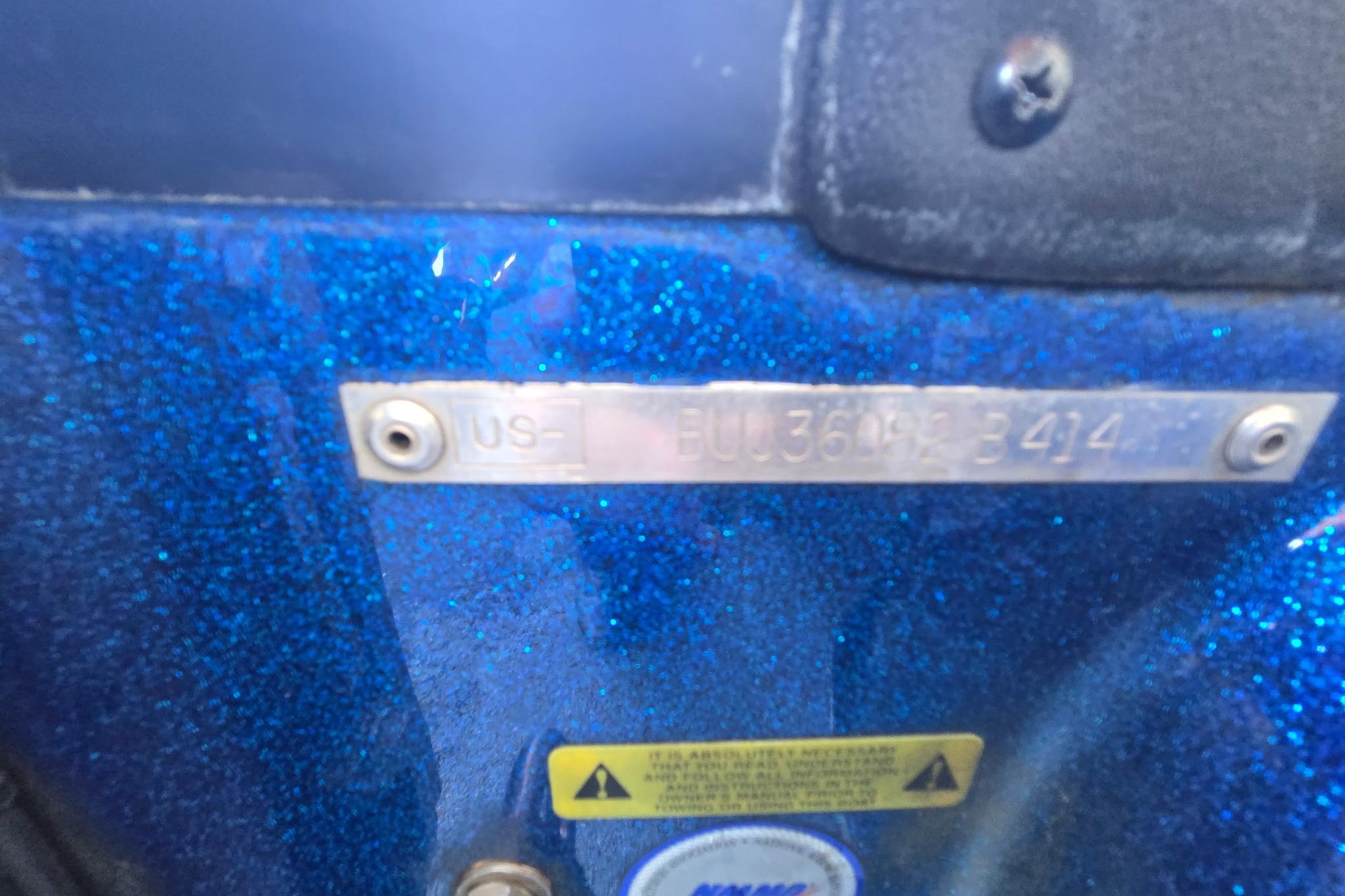 2014 Nitro Z-7 boat with blue glitter finish and identification plate.
