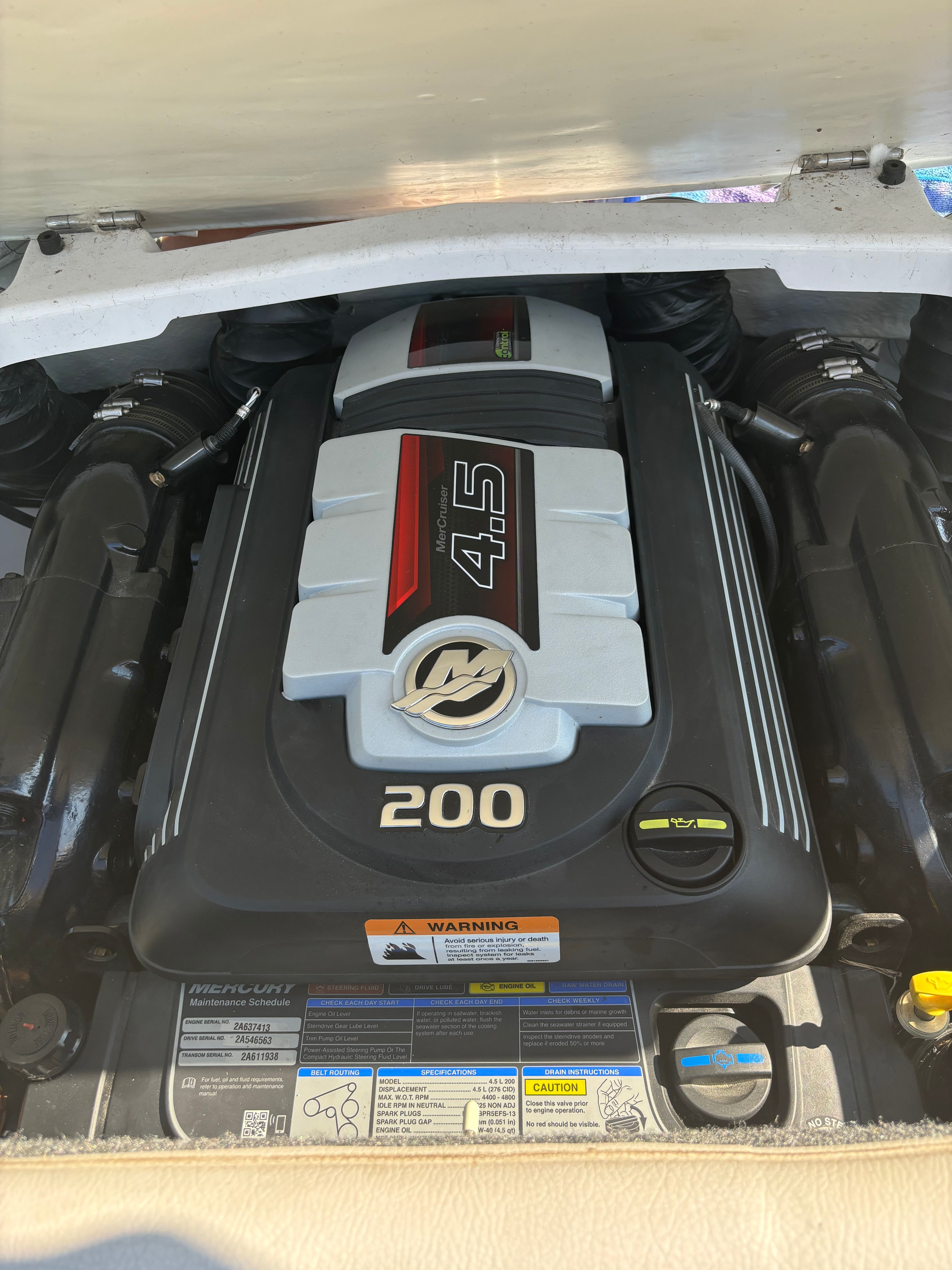 A boat engine labeled "4.5" and "200" is visible.