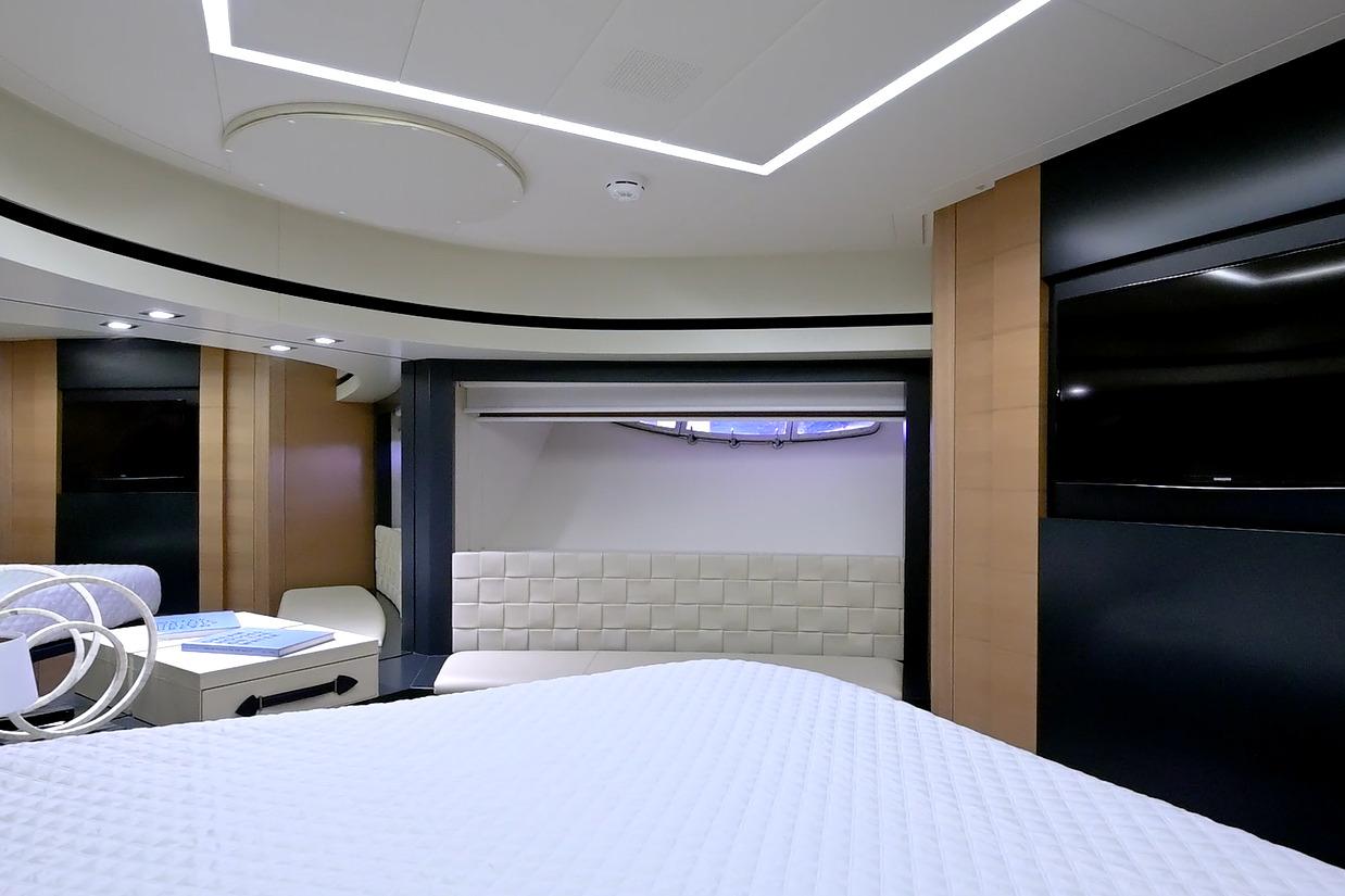Luxurious interior of a 2015 Pershing 92 yacht, featuring modern design and elegant furnishings.