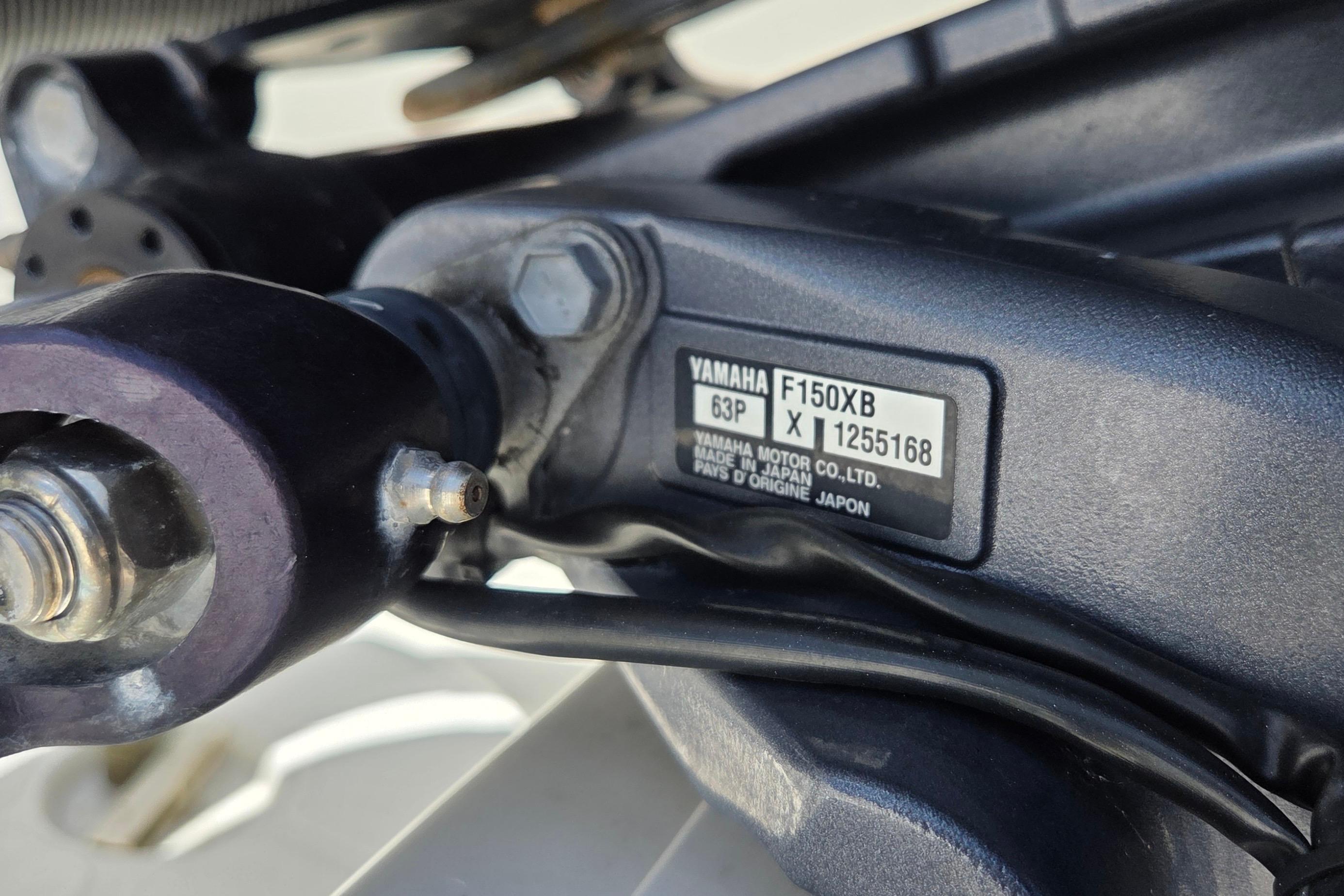 Close-up of Yamaha F150XB engine part on 2022 World Cat 255 DC boat.