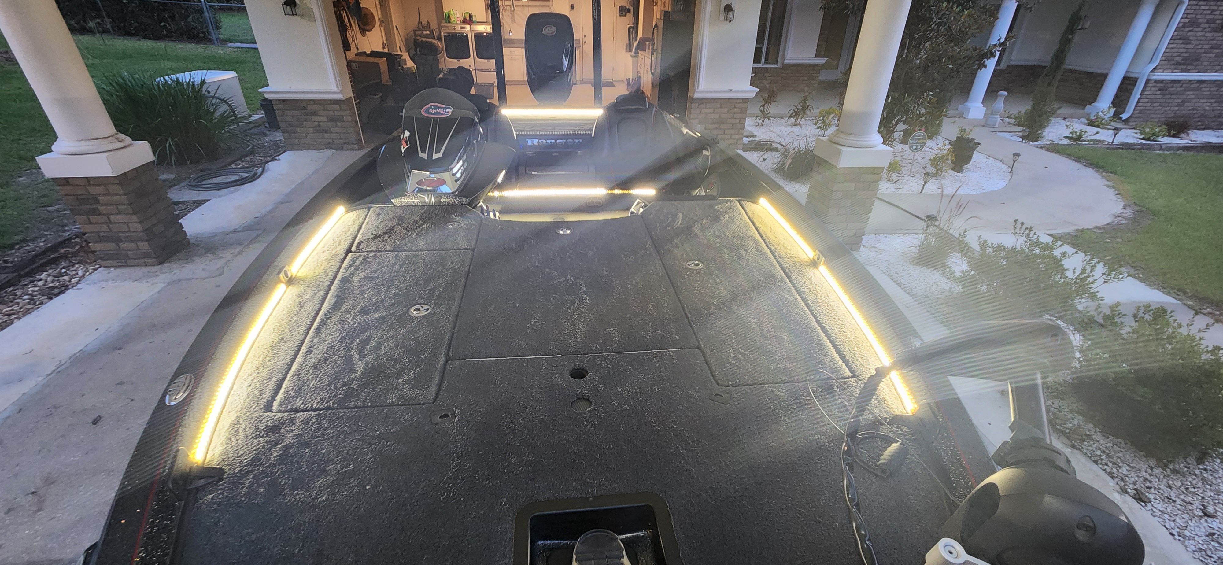 The image shows a 2017 Ranger Z520 Comanche boat with glowing LED lights.