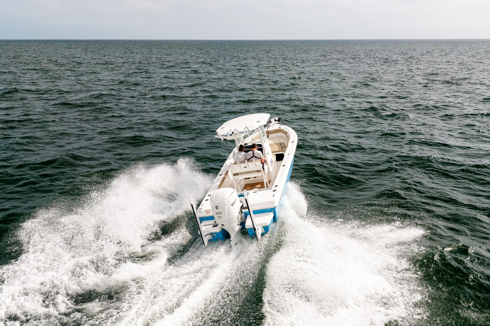 2023 Everglades 243 Center Console boat cruising on open water.