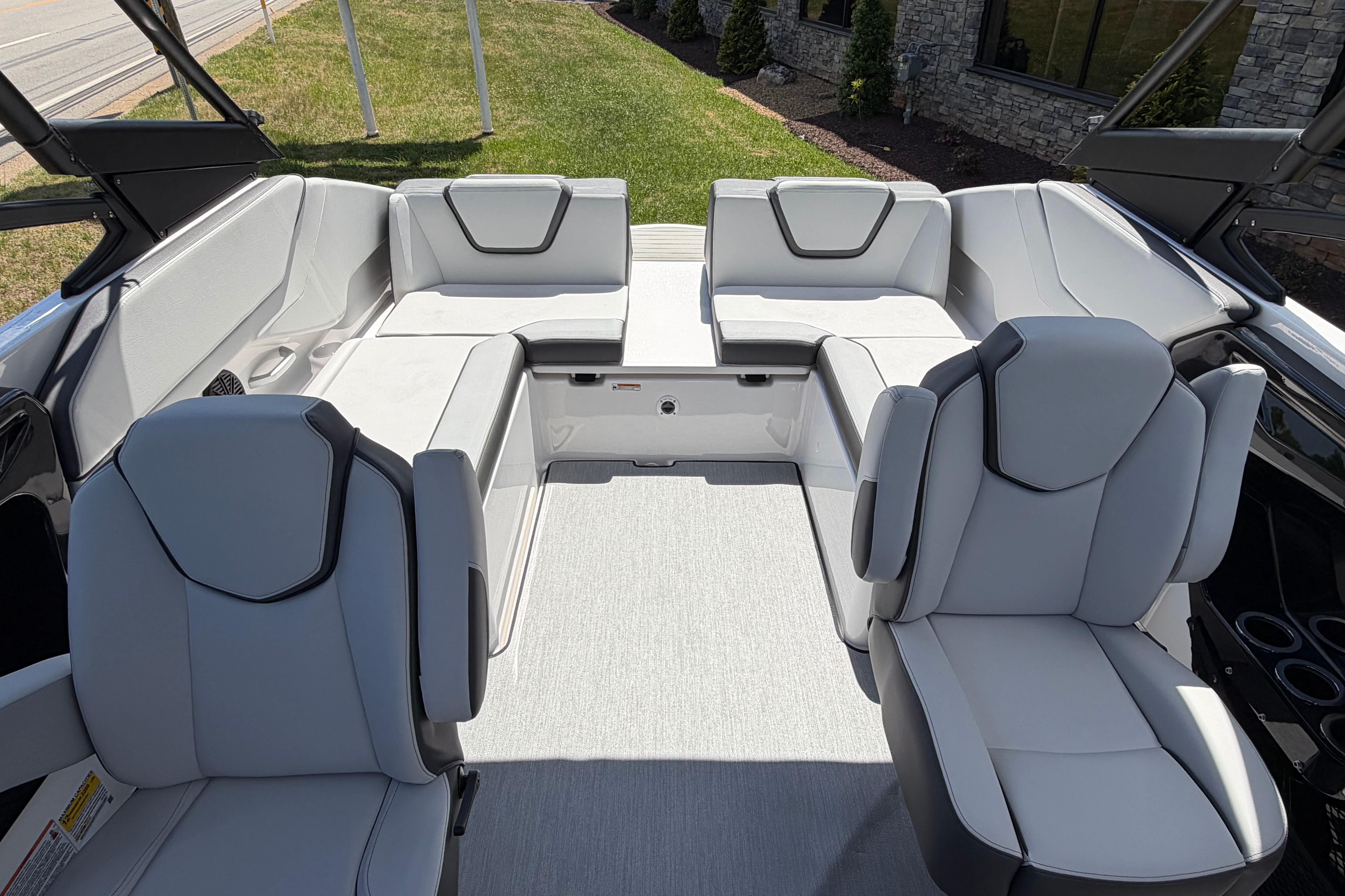 2026 Yamaha Boats AR250 interior with sleek, modern seating and spacious layout.
