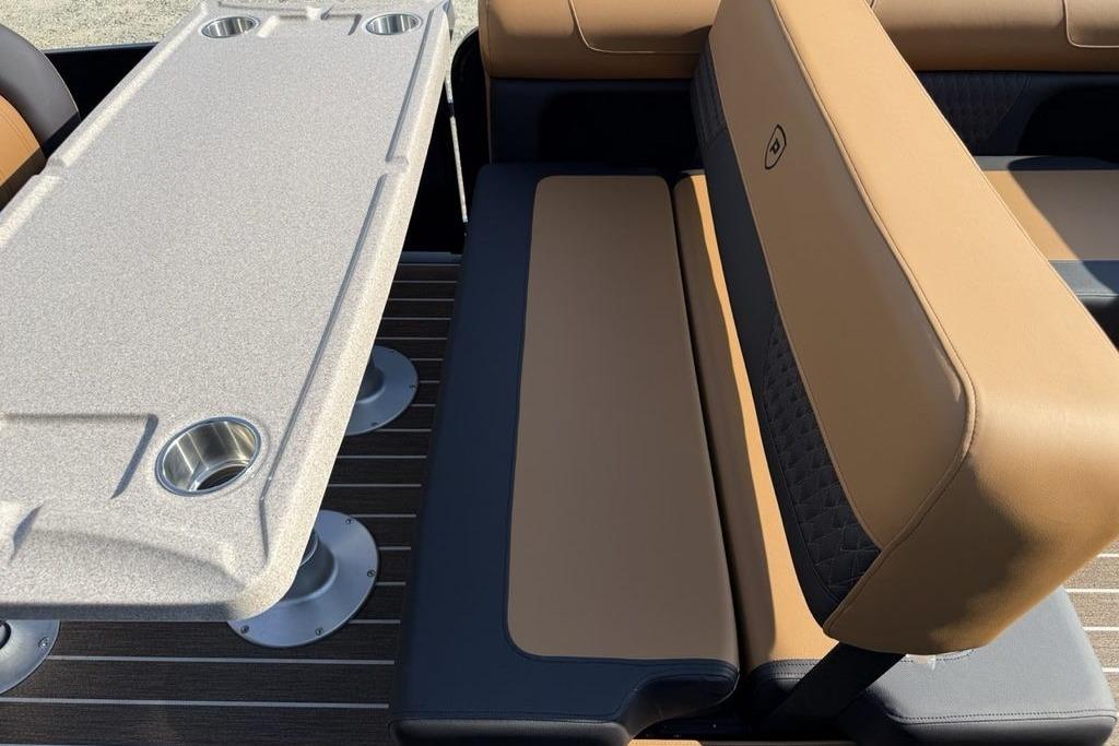 Luxurious seating and table setup on 2026 Premier 250 Solaris RS CL boat.