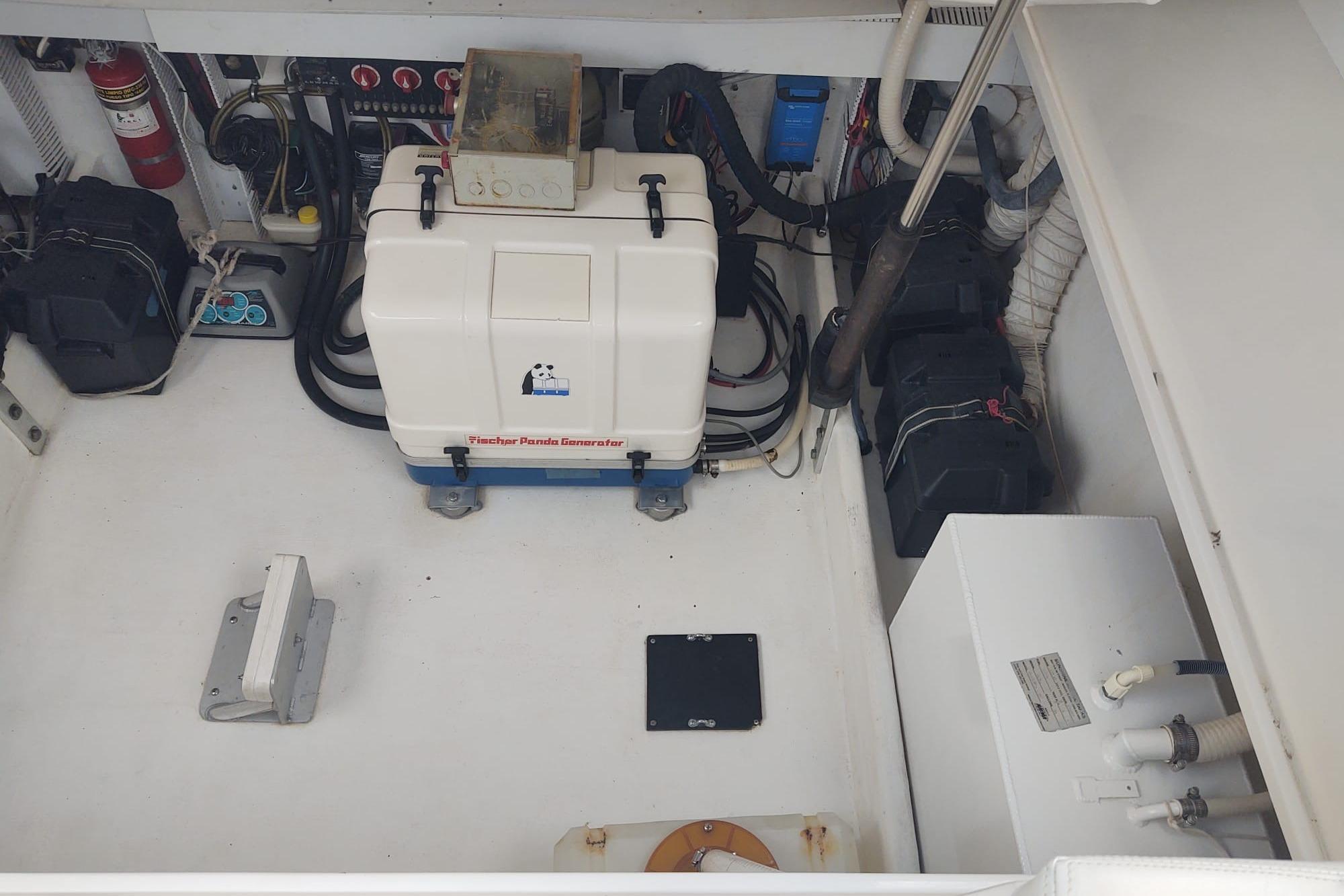 Engine room of 2008 Contender 35 Express Side Console with Fischer Panda generator.