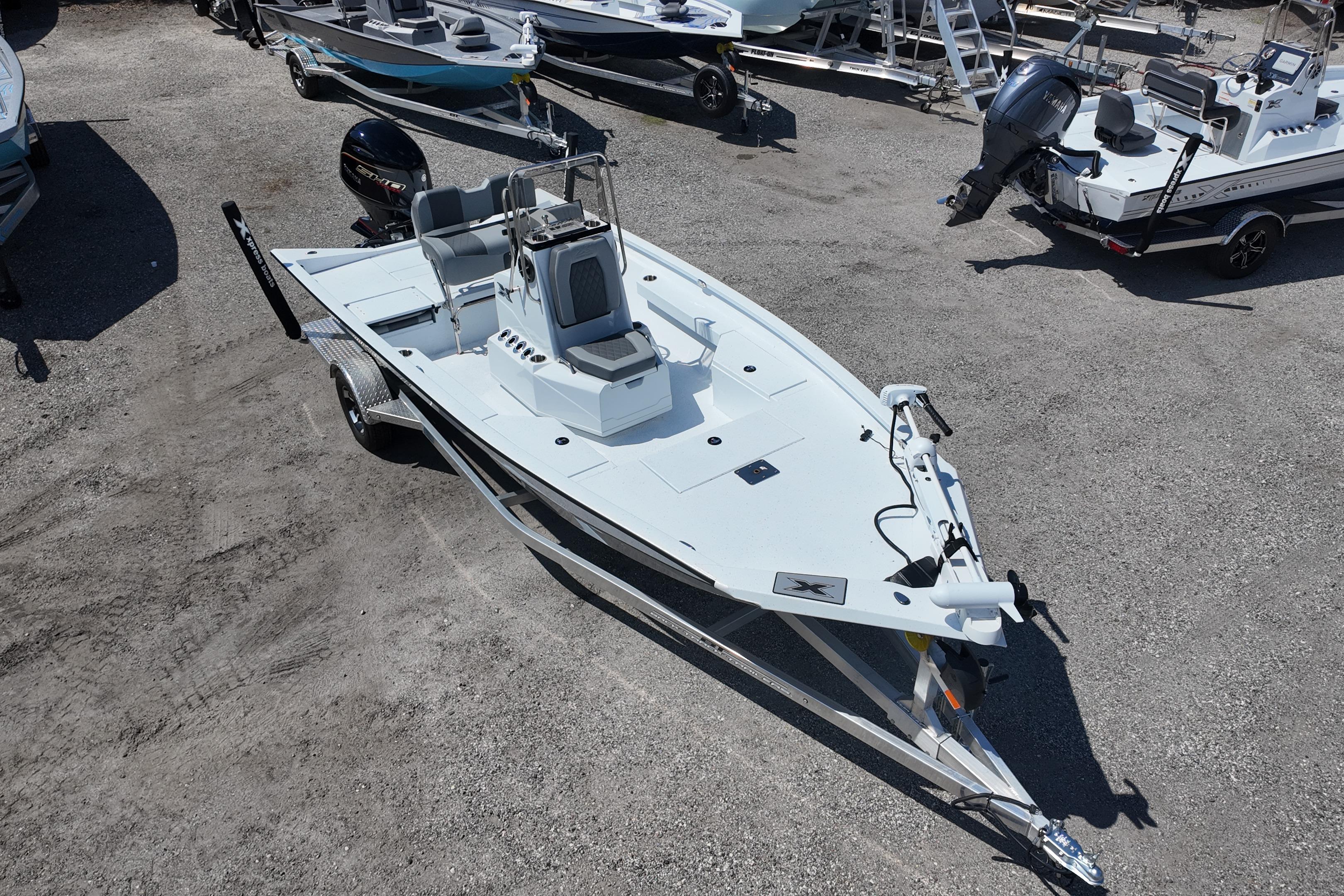 2026 Xpress H20 boat on trailer in outdoor lot, featuring sleek design and modern equipment.