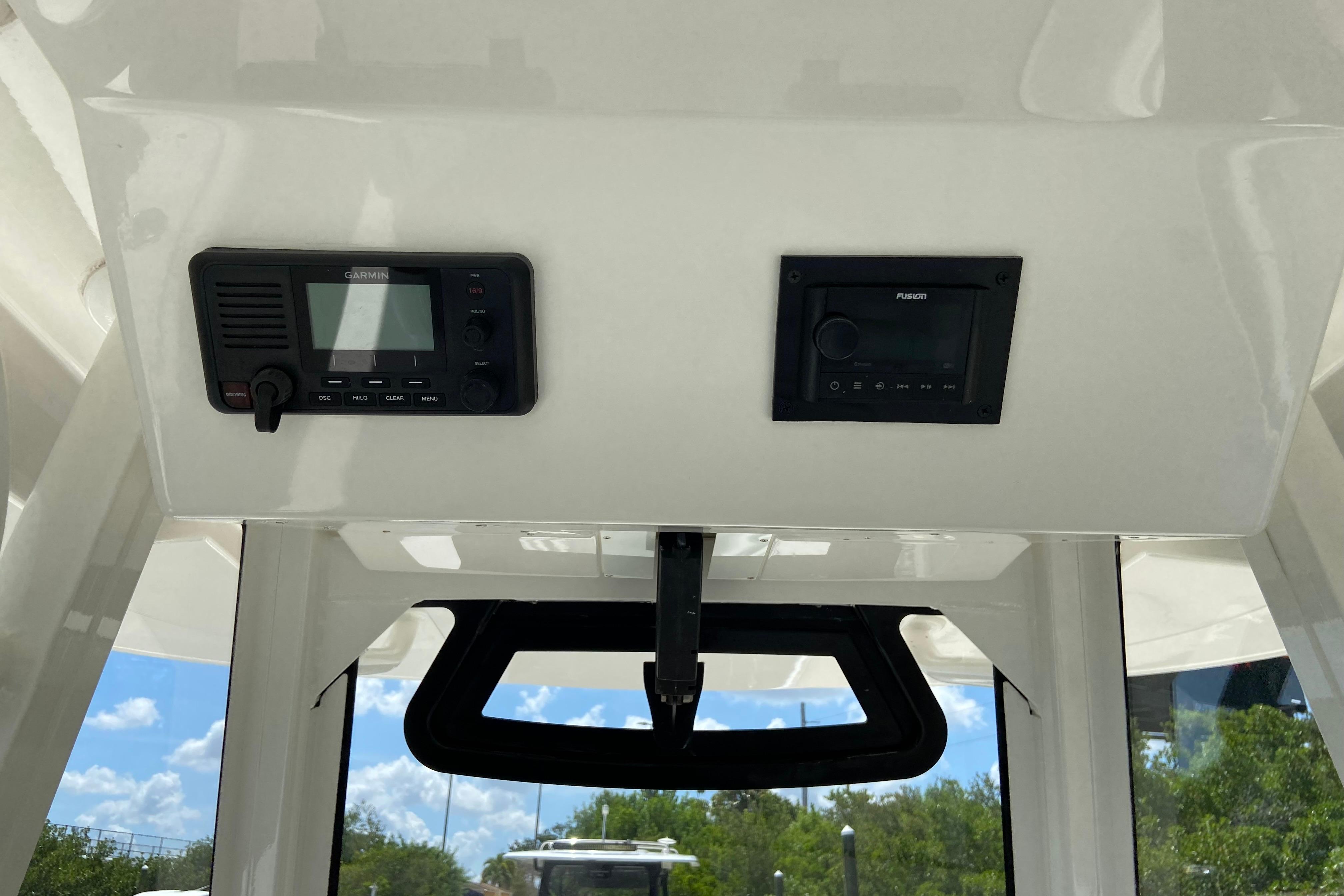 Interior view of a 2021 Regulator 28 boat featuring Garmin and Fusion electronics.