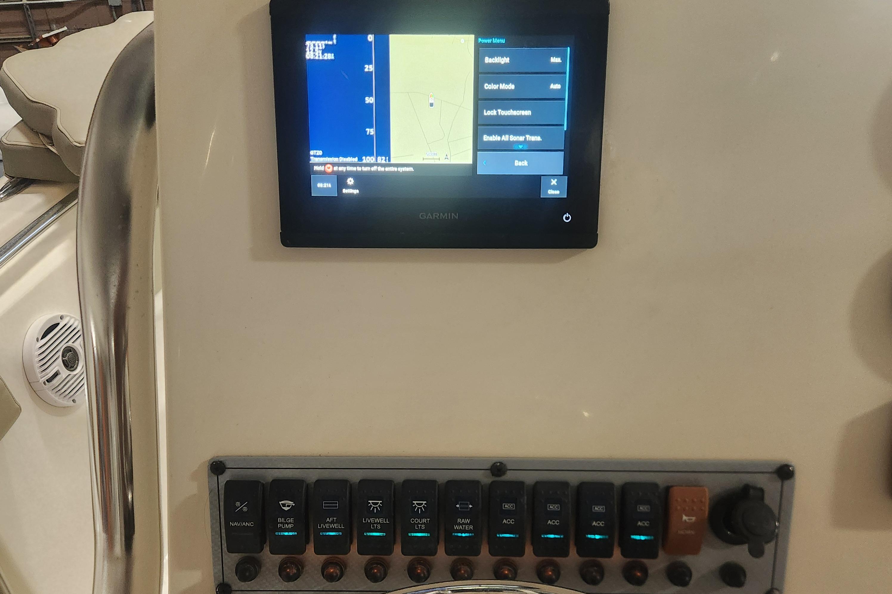 Control panel of 2023 Key West 219 FS boat with touchscreen and switches.