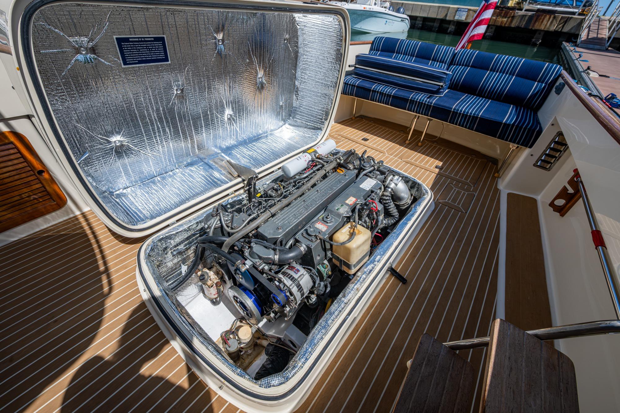 2001 Hinckley Picnic Boat Classic engine compartment with open hatch, showcasing detailed mechanics.