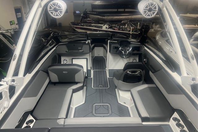 2025 Cobalt CS23 Surf boat interior with modern seating and audio system.