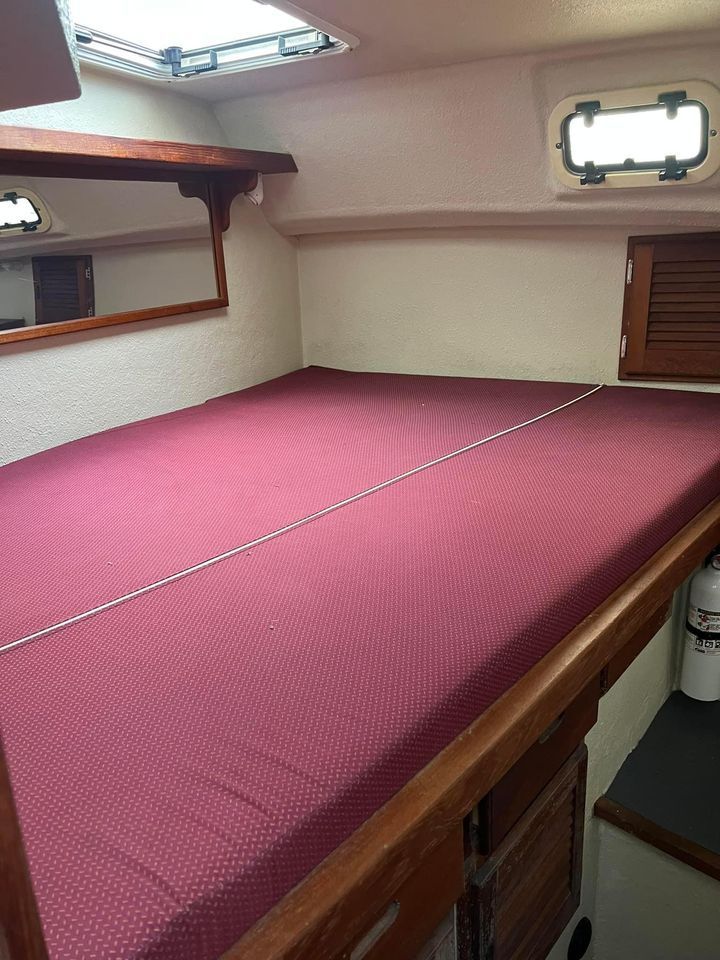 Interior of 2000 Sea Sport Pacific 32 with red bed.