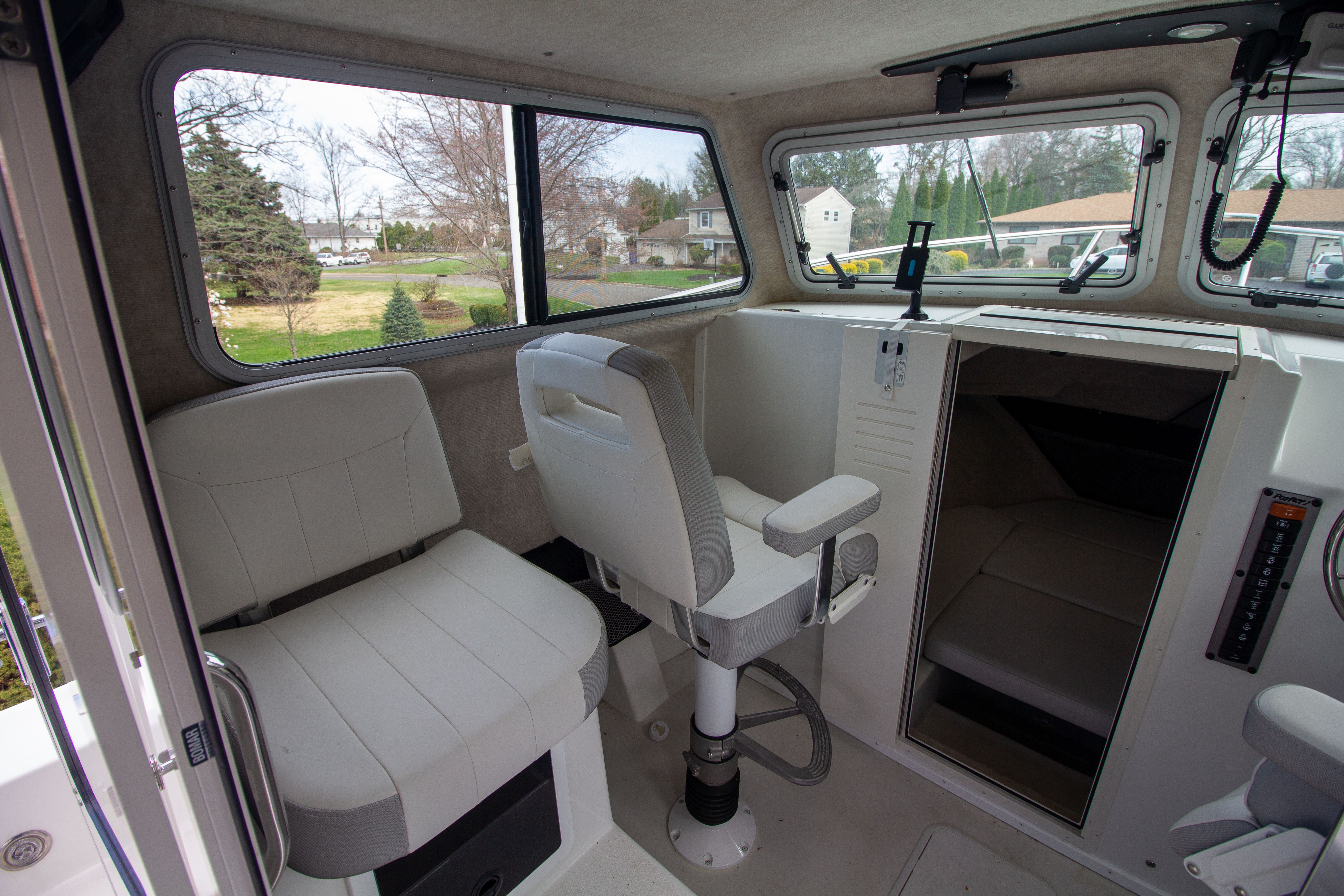 Interior of 2022 Parker 2520 XLD Sport Cabin with seating.