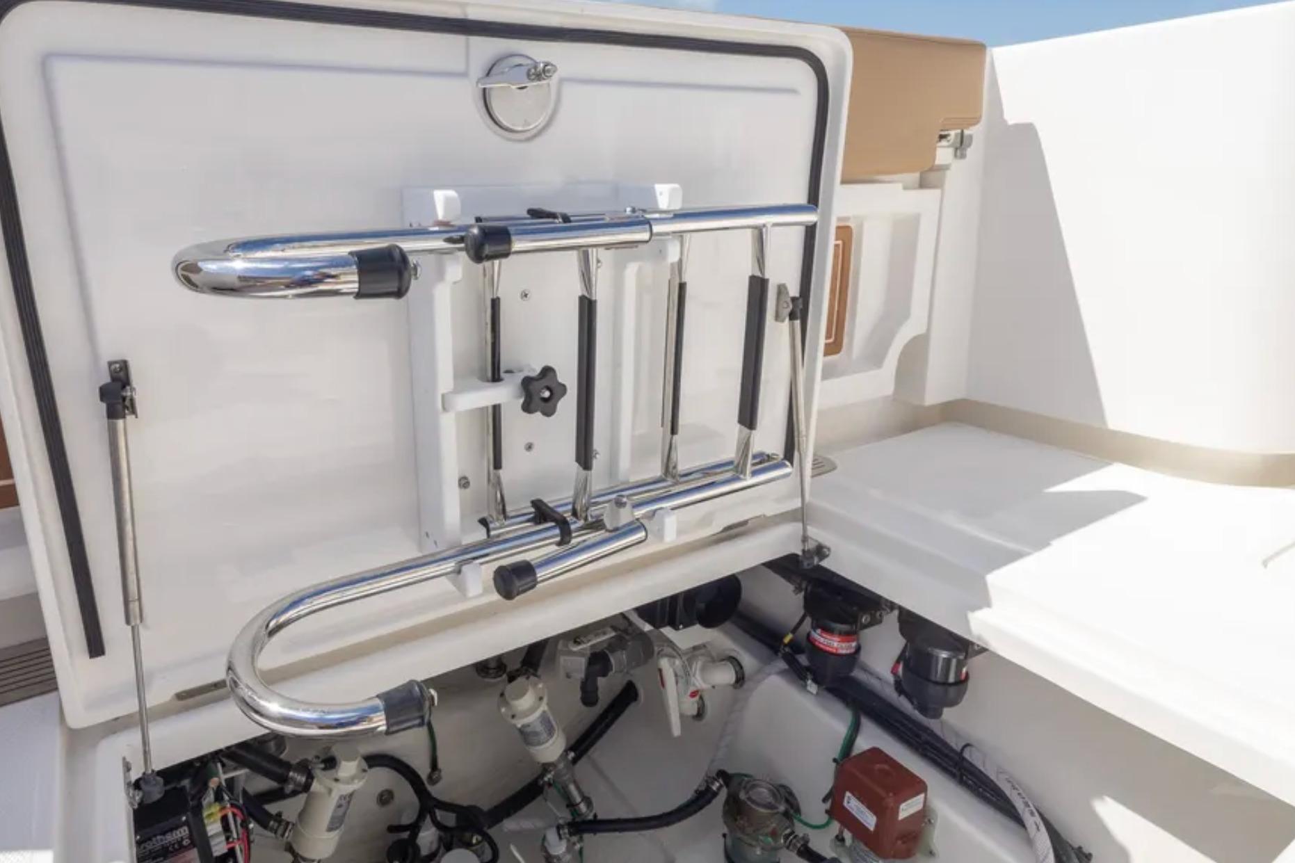 2025 Blackwater 41 Performance Fish boat engine compartment with ladder and equipment.