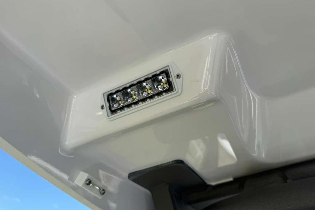 LED light fixture on 2026 Monterey Elite 30 OB boat, showcasing sleek design.