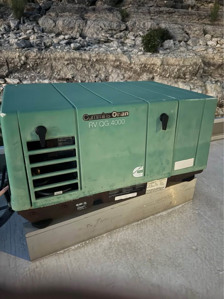 Cummins Onan RV QG 4000 generator on boat roof.