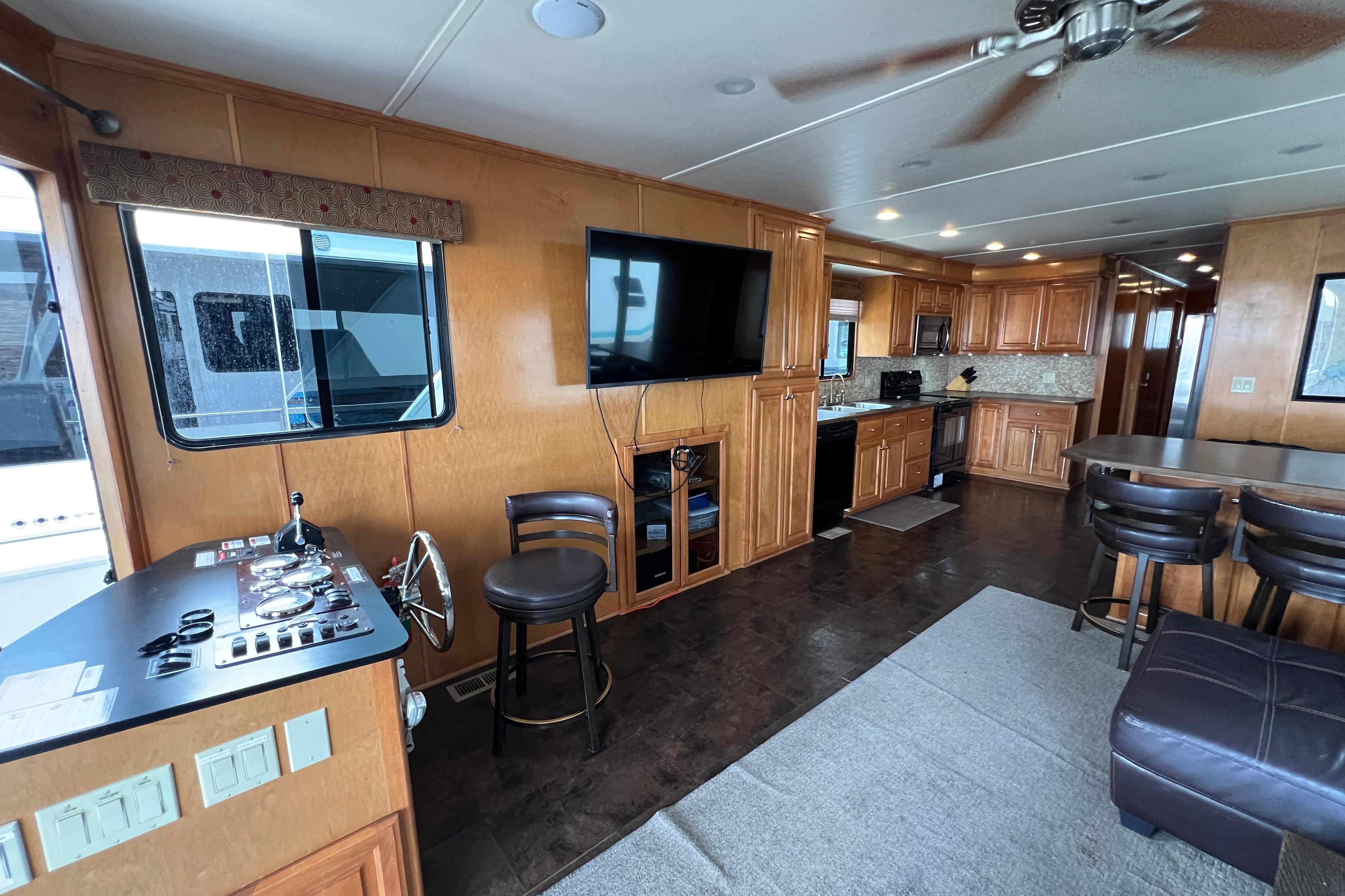 Interior of 2013 Destination Yacht Lotta Yachta with modern kitchen and entertainment area.