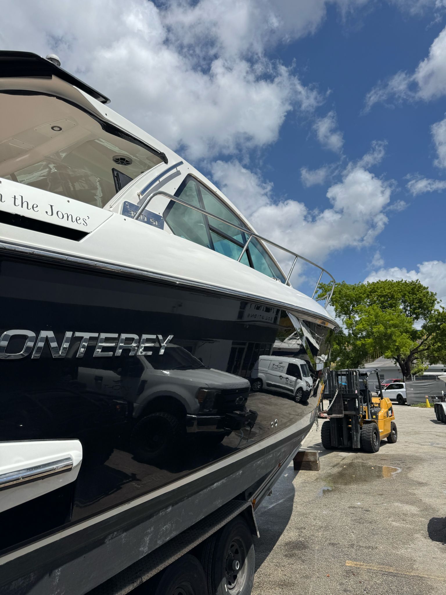 2015 Monterey 360 Sport Coupe on a trailer under sunny skies.