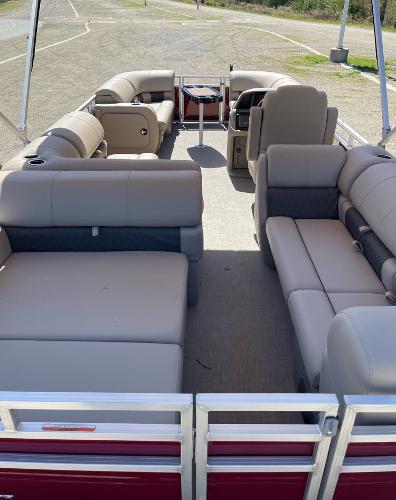 2025 Sun Tracker Party Barge 22 RF DLX pontoon boat with spacious seating and modern design.