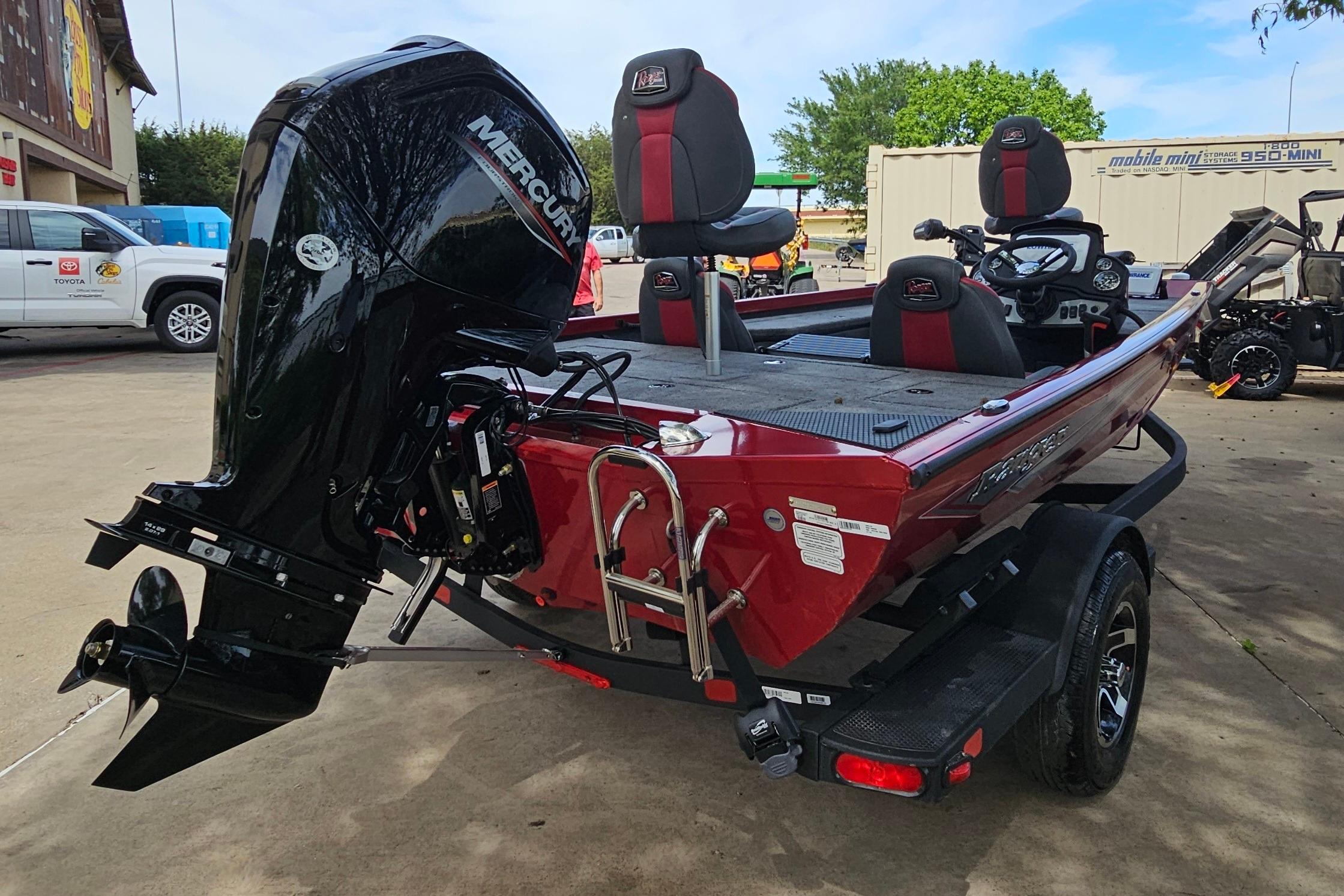 2026 Ranger RT178 boat with Mercury engine, parked on a trailer in a lot.