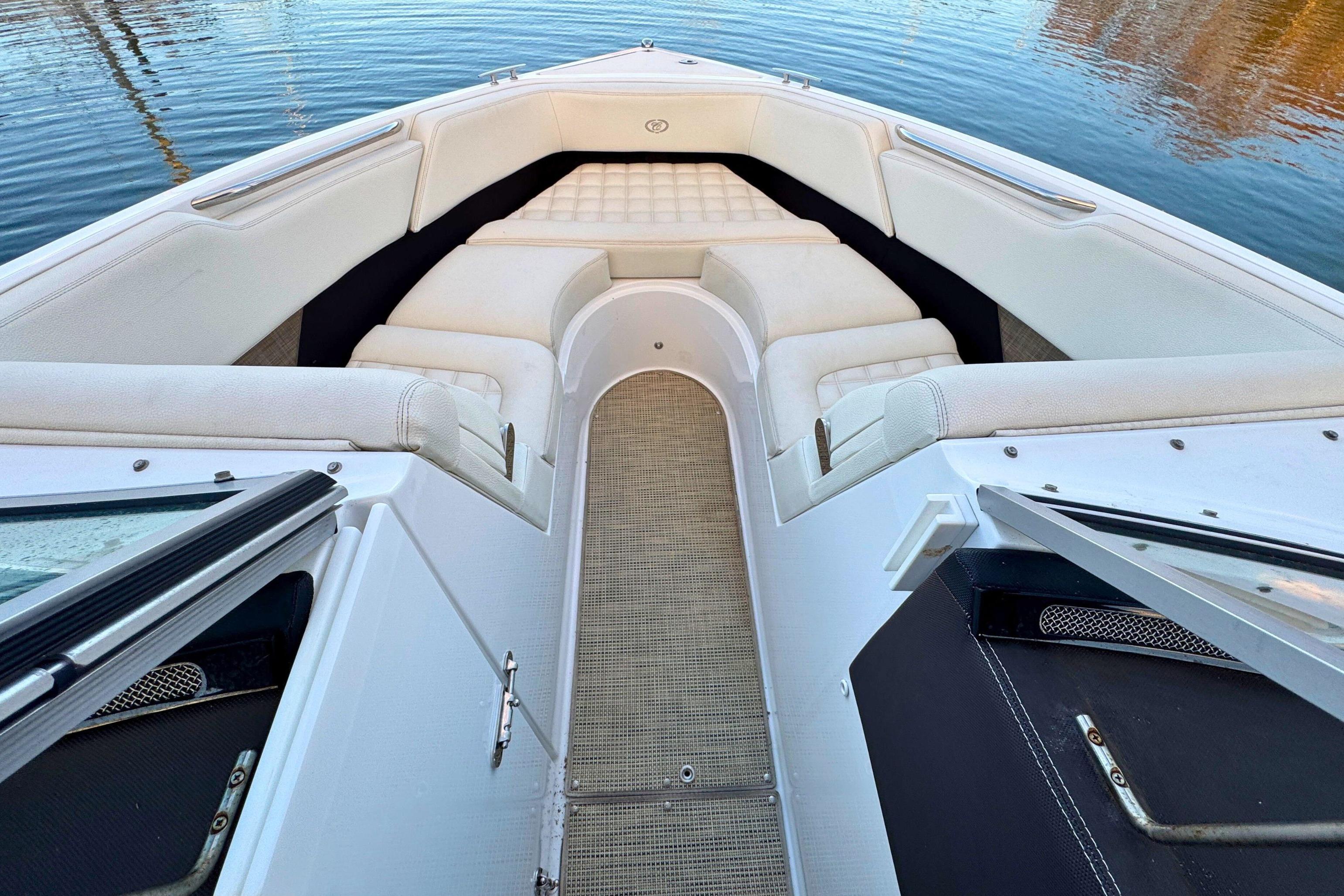 2019 Cobalt R3 boat interior with white seating and open deck on water.